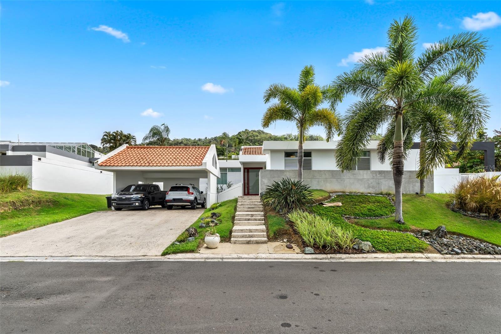 Beautiful and spacious residence located in the prestigious gated community of Laderas de San Juan. Designed for comfortable living and entertaining, this move-in-ready home features soaring high ceilings, abundant natural light, and a spacious backyard perfect for outdoor gatherings, gardening, or simply relaxing. The property is equipped with 19 fully paid-off solar panels, providing exceptional energy efficiency and long-term savings. It also includes a generator-ready electrical connection, offering added peace of mind during power outages. Residents of Laderas de San Juan enjoy outstanding community amenities, including 24/7 controlled access and security, a swimming pool, tennis courts, and a clubhouse with an activity room.

This is an exceptional opportunity to own a well-maintained home in one of the area's most desirable communities. Schedule your private showing today.