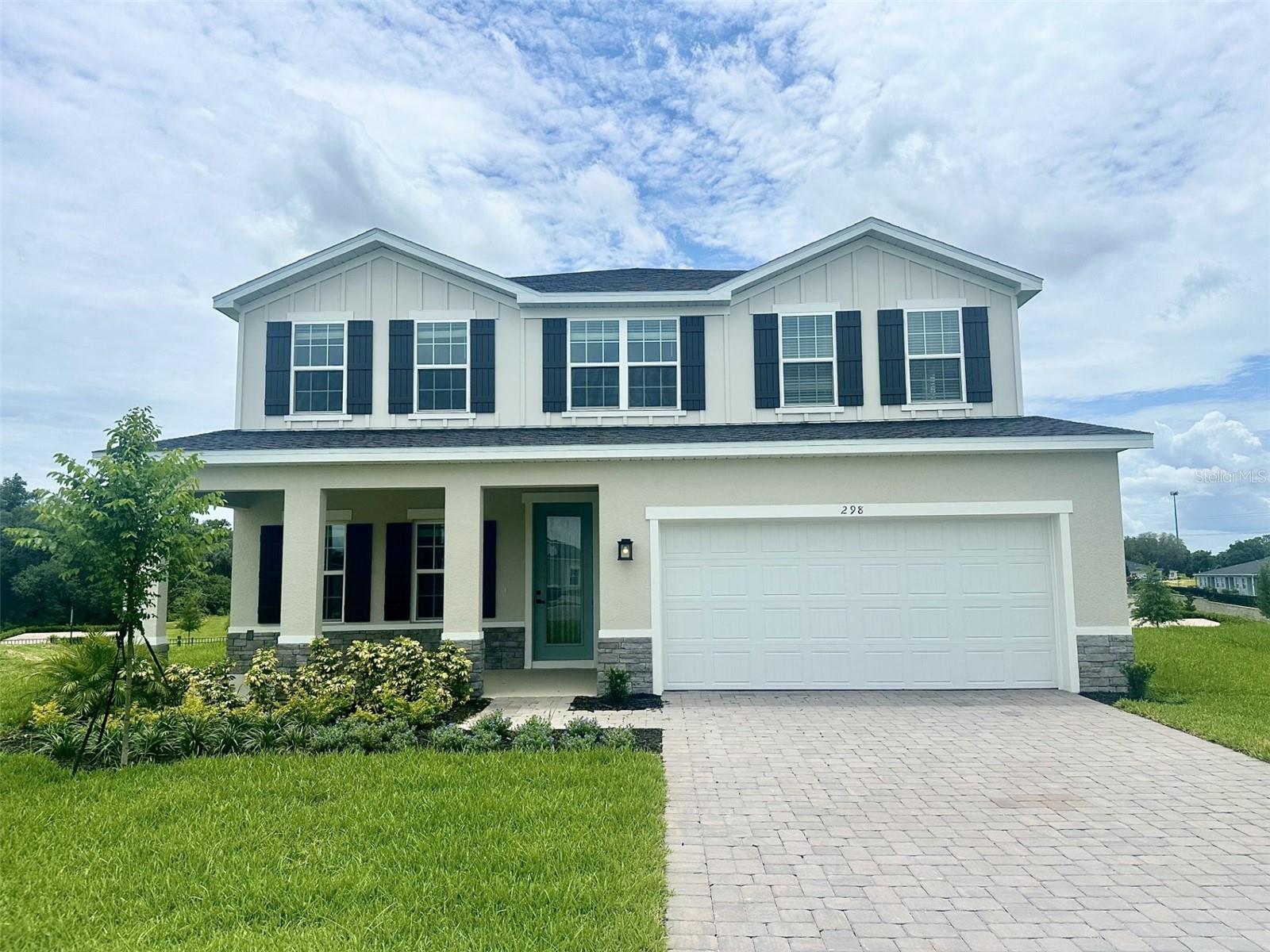 Ready to move-in! Highly sought-after Lynn Haven floor plan located in Hammock Oaks—this stunning, move-in ready home is loaded with upgrades! Featuring 4 bedrooms, 3.5 bathrooms, and a spacious 2-car plus tandem garage, this home truly has it all. The gourmet kitchen is a showstopper with double ovens, upgraded soft-close cabinetry, under-cabinet lighting, and quartz countertops throughout, all opening to a bright and spacious living area perfect for entertaining. A first-floor study provides the perfect flex space for a home office or guest area. Upstairs, you’ll find three additional bedrooms and two full bathrooms, offering plenty of space for family and guests. The luxurious primary suite is a true retreat with tray ceilings, two large walk-in closets, and a spa-like bathroom featuring a soaking tub and separate shower. Additional highlights include LED lighting throughout and blinds on all windows. Don’t miss this opportunity to own a beautifully upgraded home. Welcome to Hammock Oaks in Lady Lake, Florida! Featuring a collection of single-family homes located directly east of The Villages. Only 2 miles from everything Lake Sumter Landings has to offer. Catch a movie at the Old Mill Playhouse, grab a bite to eat at The Flying Biscuit Café, or do a little shopping at the local stores. 15 minutes away is Lake Griffin State Park, which you can explore on the multiple hiking trails, with a paddleboard, or on a guided pontoon boat tour. All Ryan Homes now include WIFI-enabled garage opener and Ecobee thermostat. **Closing cost assistance is available with use of Builder’s affiliated lender**. DISCLAIMER: Prices, financing, promotion, and offers subject to change without notice. Offer valid on new sales only. See Community Sales and Marketing Representative for details. Promotions cannot be combined with any other offer. All uploaded photos are stock photos of this floor plan. Actual home may differ from photos.