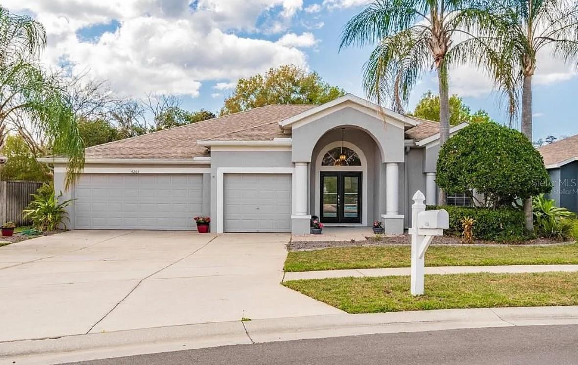 Welcome to this exceptional 4BR/3BA pool home in the beautiful gated community of Bell Landings. Offering over 2,300 SF of thoughtfully designed living space, this home features a desirable split floor plan, soaring ceilings, abundant natural light, and spacious living and entertaining areas. The kitchen opens seamlessly to the family room and overlooks the screened lanai with sparkling pool, spa, and peaceful pond views. The spacious primary suite offers lanai access, dual vanities, garden tub, separate shower, and walk-in closet. A 3-car garage provides ample storage. Conveniently located near top-rated schools, shopping, dining, golf, Tampa Premium Outlets, Wiregrass Mall, medical facilities, and major highways. Low HOA and no CDD. Experience the best of Florida living in one of Land O' Lakes' most desirable gated communities. Book your tour visit today!