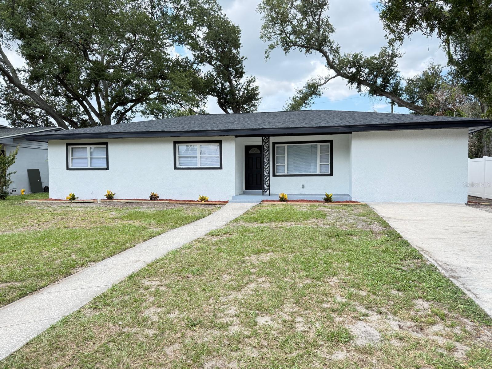 Completely remodeled and move-in ready! This spacious property offers **6 bedrooms and 3 full bathrooms**, providing plenty of room for a large family, multi-generational living, or investment opportunities. Major updates include a **roof (2022)** and **new A/C system (2026)** for added peace of mind. The renovated interior features modern finishes, updated living spaces, and a functional layout designed for comfort and convenience. Step outside to enjoy the **large and spacious backyard**, perfect for entertaining, family gatherings, pets, or creating your own outdoor oasis. Conveniently located in the heart of Tampa with easy access to shopping, dining, schools, and major highways. Don't miss the opportunity to own this beautifully updated home with exceptional space and value!