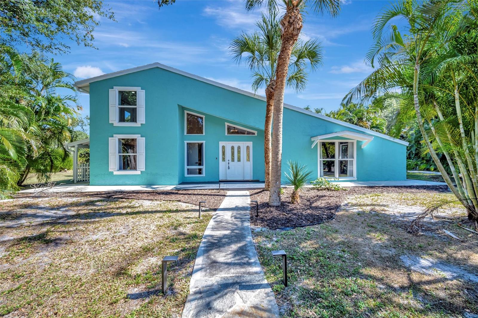 Welcome to this beautifully maintained 4 bed, 3 bath property nestled on a 2-acre lot in one of Osprey's most desirable communities Pine Ranch. Located 15 minutes from Siesta Key and Nokomis Beach and is within a short distance from the nationally top-rated Pine View School, #1 High School in Florida and the natural beauty of the Legacy Trail.  

This charming home offers a perfect blend of comfort, style, and Florida living.  Step inside to find a bright, open interior with plenty of natural light, spacious living area, and a seamless connection between indoor and outdoor living.  A newly remodeled kitchen with ample cabinetry and a seamless flow for entertaining.  The primary suite provides a peaceful retreat with generous closet space and an en-suite bath and balcony with stunning views.  Additional bedrooms are well-sized, making this home ideal for guests or a growing household.  Enjoy Florida living at its best with an inviting private backyard inground pool framed by mature landscaping perfect for relaxing, gardening, or creating your own outdoor oasis.   The backyard showcases a picturesque large pond, with a deck, making it an ideal spot for relaxing evenings.

Additionally, this property features an in-law suite with one bedroom and one bathroom, ideal for guests or extended family.  Whether you're seeking a full-time residence or a seasonal getaway, this Osprey gem delivers comfort, location, and value.  With its prime Osprey location, easy access to Sarasota and Venice, and the natural beauty of the Gulf Coast just minutes away, this home offers exceptional value and an unbeatable lifestyle.

A wonderful opportunity to own in one of Sarasota County's most desirable communities don't miss your chance to make 403 Longbow Trail your next home.