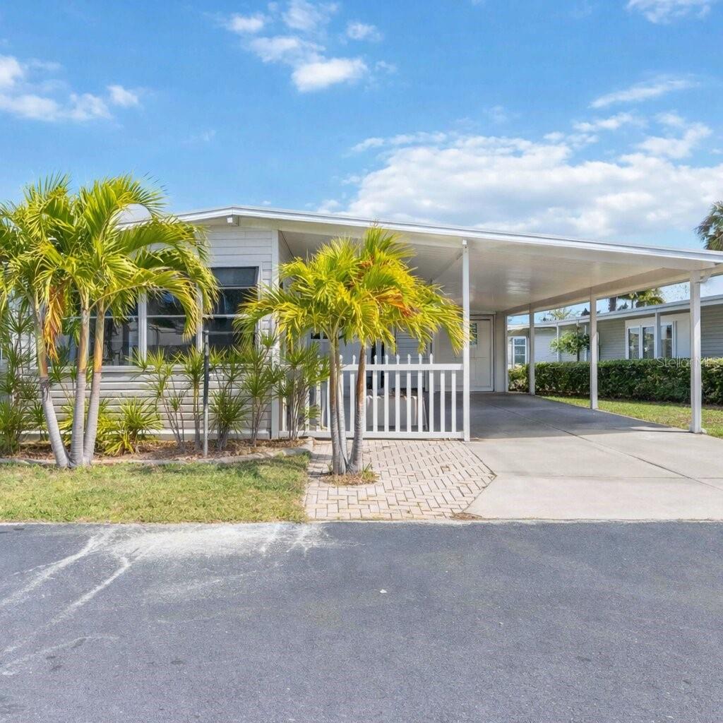Seller is offering $5,000 credit to buyer's shares! Welcome to 10303 Burnt Store Road, Lot 54, in the sought-after Eagle Point 55+ community in Punta Gorda, Florida. This beautifully maintained 1,100-square-foot doublewide offers two spacious bedrooms and two updated bathrooms, delivering comfort, style, and peace of mind in one of Southwest Florida’s most active and engaging resident-owned communities.

Inside, you’ll immediately appreciate the newer waterproof laminate flooring that flows throughout the main living areas and bedrooms and tile in the Florida room. The bright and inviting Florida room features its own wall unit, creating a flexible space perfect for morning coffee, hobbies, or entertaining guests year-round. The kitchen has been thoughtfully updated with newer appliances, refreshed cabinetry, and updated countertops, offering a clean, modern aesthetic and excellent functionality. Both bathrooms have been tastefully renovated, and the primary suite features a walk-in shower and direct access to the en-suite bath for added convenience and privacy.

This home is truly move-in ready, allowing you to focus on enjoying the lifestyle that Eagle Point is known for.

Eagle Point is a vibrant, amenity-rich waterfront community along Alligator Creek designed for an active and social lifestyle. Residents enjoy a heated pool, Wi-Fi-enabled clubhouse, library, grill area, billiards, ping pong, shuffleboard, bocce, and opportunities for fishing and kayaking. Boat launch and storage permits are available by application, making it easy to embrace Florida’s boating lifestyle. HOA dues of $789.11 per quarter include water, sewer, trash, recreational facilities, and road maintenance. Ownership requires the purchase of 20 community shares at $1,000 each. Two small pets are welcome.

The location offers exceptional convenience. Grocery shopping is close by at Publix Super Market at Burnt Store Marketplace and ALDI. Medical care is readily accessible with ShorePoint Health Port Charlotte and Bayfront Health Punta Gorda nearby. Major roadways including Burnt Store Road, Tamiami Trail (US-41), and Interstate 75 provide easy access throughout the region. Punta Gorda Airport offers service to more than 55 destinations, while Fishermen’s Village and the Sunseeker Resort Charlotte Harbor provide dining, shopping, and waterfront entertainment just minutes away. Nearby cities include Port Charlotte, North Port, Venice, Cape Coral, and Fort Myers, and the Gulf beaches of Venice and Fort Myers are a short drive from your front door.

This is an exceptional opportunity to secure a well-updated home in a premier 55+ waterfront community with outstanding amenities and a location that keeps you connected to everything Southwest Florida has to offer. Schedule your private showing today and begin the next chapter of your Florida lifestyle in Eagle Point.
