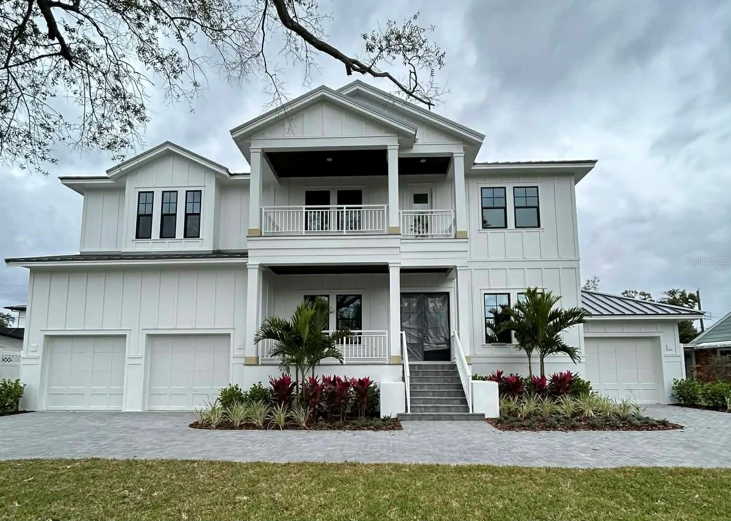 Under Construction. Under Construction. Nearing Completion. Luxury Living on Davis Islands – Ready Mid 2026 with full selection lookbook available NOW!

Mobley Homes Custom is crafting a masterpiece on an oversized 90x126 lot in the Gorrie, Wilson, Plant School District. This South Tampa gem features 10’ ceilings, 8’ doors, and hardwood floors throughout (except baths), with premium finishes and a double AC system.

The open island kitchen is a showstopper, equipped with a 48" Classic Side-by-Side Refrigerator/Freezer, dual 24" Drawer Microwaves, and a  Paneled Dishwasher. It features Napa micro-shaker cabinets in white oak, quartz countertops in Abaco White, an apron sink, pot filler, and bar faucet in the Butler’s Pantry. Custom lighting and a breakfast nook elevate the space, complemented by a double walk-in pantry, mud room & command center. 

Outside, you’ll find a beautiful pool/spa with outdoor kitchen under a covered lanai, along with a fenced yard, pool cage, and bamboo landscaping that will grow into over the next year to provide privacy. All connected to a downstairs pool bath and guest room... you'll also enjoy a study, formal dining room, living room with fireplace, & powder room with a standalone vanity all on the lower level.

The owner’s retreat upstairs offers a spacious sleeping space, expansive his-and-her walk-in closets with built-ins installed, and a spa-inspired bath with Napa micro-shaker cabinets, split vanities, a grand shower, four sconce lights, and marble mosaic floors. Four secondary bedrooms, loft, feature hardwood floors and 5” crown molding. The foyer includes bead detailing and Kwikset Halifax matte black door hardware.

Upstairs features four bedrooms (including three suites), a loft area, balcony, and a laundry room with a stackable 5.0 cu. ft. Smart Front Load Washer and 7.8 cu. ft. Smart Front Load Electric Dryer.

Exterior highlights include SW 7005 Pure White body/trim, SW 7048 Urbane Bronze garage, and a Raven-stained front door. Pavers in a Herringbone 90 pattern (Tremron/Granite, Grey) adorn the driveway, lanai, and porch, with gas coach lights enhancing curb appeal. The outdoor kitchen boasts a Tradewind 38” hood, 32” Artisan Grill, and Zephyr 24” Beverage Cooler.

This Davis Islands stunner is not to be missed!