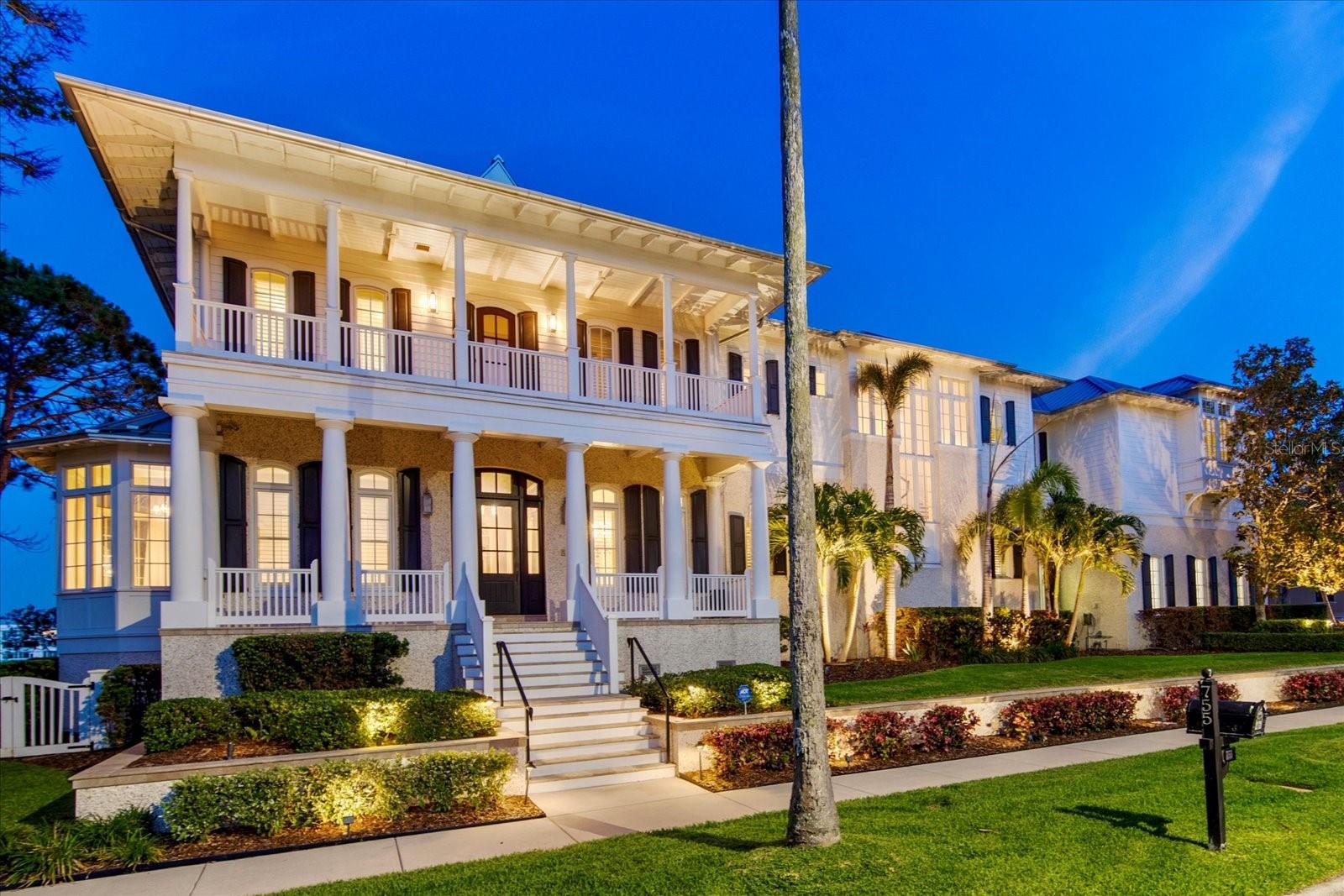 One or more photo(s) has been virtually staged. Welcome to one of Clearwater Beach’s most exceptional coastal residences, a masterfully crafted estate built by renowned builder Monogram in 2012. Commonly known as the "Crown Gem" of the beach. Situated on two oversized lots and boasting 152 feet of breathtaking waterfront on the coveted Mandalay Channel, this coastal traditional masterpiece offers over 6,400 square feet of refined living space and nearly 10,000 square feet under roof—a rare opportunity for the most discerning buyer.

Constructed entirely of block and elevated above the flood plain (high & dry from recent storms), this residence was built to the highest standards. The metal roof, impact-rated windows and doors, and whole-house security system provide unparalleled peace of mind, while refined touches such as natural wood flooring, unmatched detailed woodwork and ceilings, a gourmet chef’s kitchen with top-of-the-line appliances, and natural gas service ensure luxury and comfort at every turn.

Designed with both elegance and functionality in mind, the home features 5 spacious bedrooms and 5.5 baths, including a private in-law suite with its own entrance—perfect for extended guests or multigenerational living. Additional highlights include an executive office, two laundry rooms, and four oversized garages, offering ample space for work, relaxation, and entertaining.

Step outside to your private waterfront oasis, where a sparkling pool, lush green space, and an oversized dock with a 30,000 lb boat lift await. Whether you're enjoying a morning coffee with panoramic water views or heading out for a day on the Intracoastal, this estate defines the ultimate Florida lifestyle.

Don’t miss this rare opportunity to own a true architectural gem in one of Florida’s most prestigious beach communities. Make your appointment today.