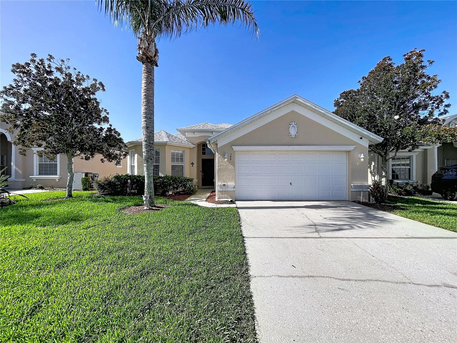Welcome to resort-style living in the gated community of Calabay Parc at Tower Lake. This beautifully maintained 4-bedroom, 3-bath home offers the perfect blend of comfort, flexibility, and investment potential. Inside, you'll find soaring ceilings, tile flooring throughout, and a spacious split-bedroom floor plan that creates privacy while keeping the kitchen and dining areas open for entertaining or everyday living. Step outside to your own private oasis featuring a heated in-ground pool and spa, perfect for relaxing after a day on the lake or enjoying the Florida sunshine. Major updates include a new roof (2025), New HVAC (2026), water heater (2026), and pool heater (2026), providing added peace of mind. Previously operated as a successful short-term vacation rental, the home can easily be converted back, as the HOA allows short-term rentals. Residents also enjoy a guarded entrance along with exclusive access to Tower Lake's private boat ramp and dock. Whether you're looking for a primary residence, vacation home, or income-producing property, this home delivers the Florida lifestyle you've been searching for.