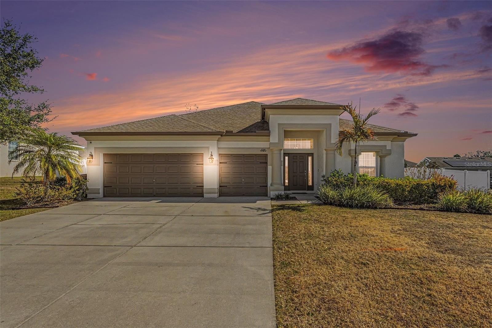 One or more photo(s) has been virtually staged. PRICE IMPROVEMENT! 1 Year Home Warranty included! MOVE IN READY! This stunning 4-bedroom, 3-bath home offers a thoughtfully designed layout featuring a dedicated office, family room, formal living room, and formal dining room, providing space for both everyday living and entertaining. The heart of the home is the expansive kitchen, complete with a huge center island and a sunny kitchen nook, all flowing seamlessly into the main living areas. Additional highlights include a 3-car garage, corner lot, large lot, low HOA, and no CDD. Recently updated with fresh interior paint in 2025 and a new AC in 2022.
Blending luxury and modern design, this home truly has it all. From the moment you arrive, you’ll appreciate the curb appeal and spaciousness that comes with a premium corner lot. Inside, the open yet functional floor plan offers flexibility for working from home, hosting guests, or relaxing with family. The oversized kitchen island is perfect for gatherings, while the multiple living spaces ensure everyone has room to spread out.
Ideally located just minutes from Saint Leo University and the Lagoon, and close to top shopping and dining destinations including The Grove at Wesley Chapel, Wiregrass Mall, and Tampa Premium Outlets. Plus, enjoy an easy commute with downtown Tampa approximately 30 minutes away.
This home has everything you need—and more. Be sure to view the floor plan and check out the video tour to experience it for yourself!