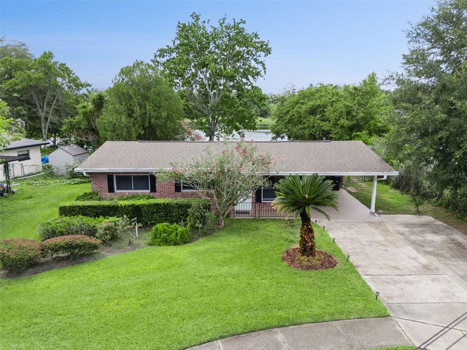 Welcome to this beautifully updated 3-bedroom, 2.5-bathroom lakefront home, perfectly situated on a charming tree-lined street in the heart of Altamonte Springs. Offering picturesque views of Lake Maltbie, an incredible backyard, and extensive modern updates throughout, this home combines comfort, style, and an unbeatable location. Step inside to discover a bright and inviting floor plan featuring a spacious living room, dining room, and a stunning, newly updated kitchen complete with wood cabinetry, granite countertops, and stainless steel appliances. A huge laundry room offers incredible flexibility and can easily serve as a home office, workout room, hobby space, playroom, or additional storage. Thoughtfully updated throughout, this home provides peace of mind with a new roof (2022), A/C (2024), water heater (2024), flooring (2024), and kitchen appliances (2024). Enjoy Florida living at its finest in the expansive private backyard overlooking beautiful Lake Maltbie. Whether you're relaxing on the screened patio, entertaining under the additional covered patio, or gathering around the fire pit, this outdoor oasis is perfect for enjoying the peaceful lakefront setting. With no HOA, you'll have the freedom to truly make this property your own. Ideally located just minutes from Cranes Roost Park, Altamonte Mall, Winter Park, shopping, dining, major highways, and a nearby hospital, this home also offers convenient access to Downtown Orlando and Central Florida's many attractions. This is a wonderful opportunity to own a beautifully updated lakefront home in one of Altamonte Springs' most desirable locations. Schedule your private showing today!