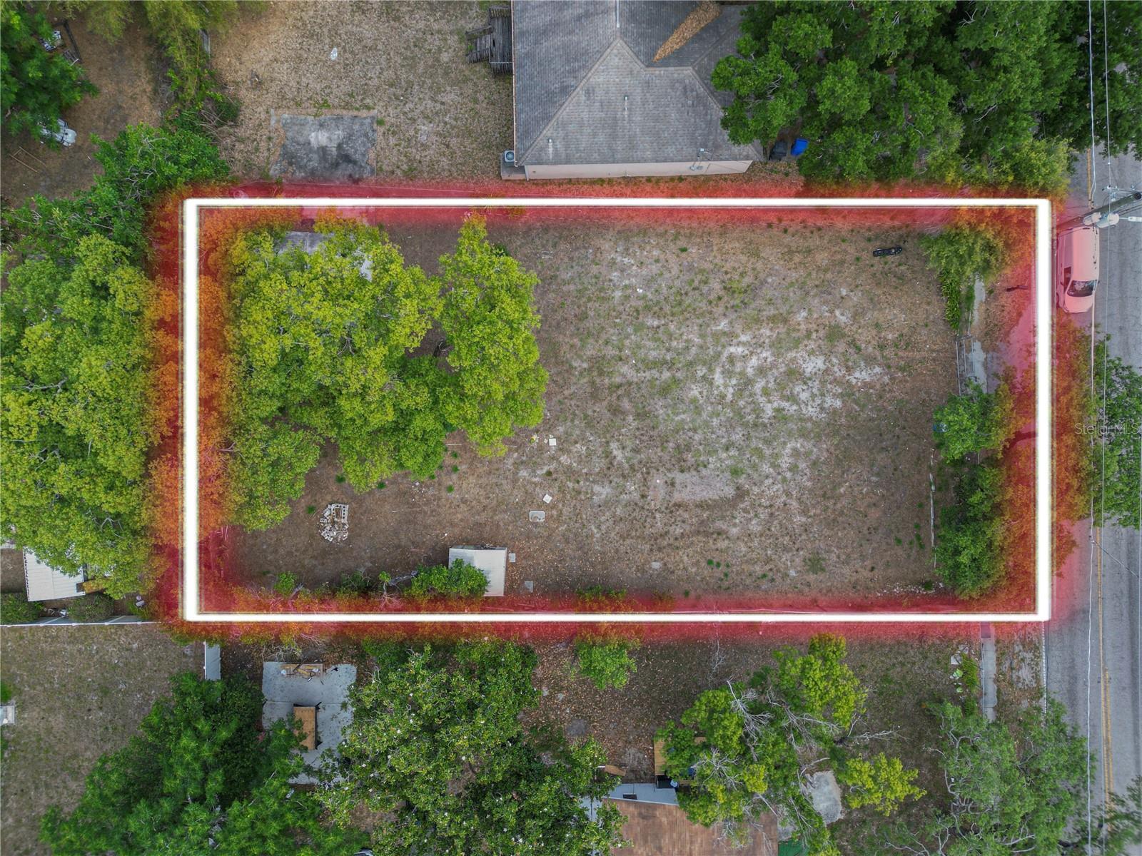 Great opportunity to own a fully fenced vacant lot in a convenient Tampa location. Utilities are already in place, with NEWER well, making this property ideal for a future homesite or investment opportunity. Centrally located just minutes from Hard Rock Casino, Busch Gardens, Ybor City, shopping, dining, and major interstates, offering quick access throughout Tampa and surrounding areas. Endless potential in a rapidly growing area.