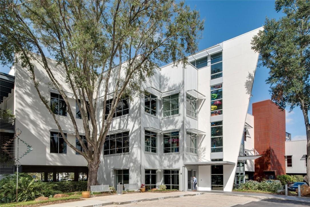 Discover a rare opportunity to own a Class A workspace unlike anything else in Central Florida. Our 60,000-square-foot, well-maintained and environmentally conscious building on Keller Road in Maitland is thoughtfully designed to minimize environmental impact while maximizing aesthetic appeal and human experience. Constructed with sustainable materials and advanced energy-saving features—including low-emissivity glass, low-VOC paints and adhesives, recycled carpeting, low-flush toilets, and waterless urinals—this “green” building sets a new standard for responsible development.

Architecturally, the structure is a curated blend of angles, glass, Corten steel, natural stone, and vibrant landscaping. Every element works in harmony to create a striking piece of modern design that feels organically integrated into its surroundings. The result is a space that is not only environmentally responsible but deeply inspiring.

From the moment you arrive, it’s clear this is no ordinary commercial building. A dramatic three-story atrium with expansive glass panels makes a bold first statement. Inside, eco-smart design enhances the natural light flowing through oversized windows, reducing the need for artificial lighting. Layered materials—specialty wall coverings, slat walls, raised Plexi details, and custom millwork—add texture, depth, and dimensional interest, transforming the interior into an immersive, modern atmosphere. It is a workspace that feels alive: creative and intentional.

Outdoor spaces elevate the experience even further. Covered and open-air patios provide a treehouse-like retreat where employees and guests can relax among natural shade or enjoy sunlight filtered through the surrounding canopy. The property also includes a fully equipped fitness facility, and the entire building is wired for integrated stereo sound.

On-site Gym, Covered and Open Patios, 50 Covered Parking Spots with Ample Open Parking.

This is more than a place to work. It’s a place where innovation thrives, creativity rises, and sustainability leads the way.