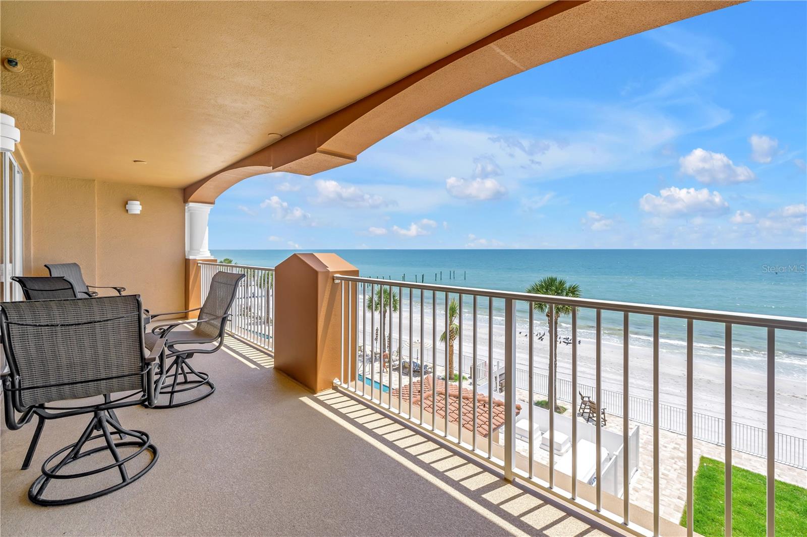 Where the sky melts into the Gulf each evening and salt air drifts through open doors, life at La Contessa in Redington Beach feels beautifully unhurried. Setting this exceptional residence apart at the very beginning is the private one-car garage (in addition to an assigned parking space) - a true rarity for beachfront condos. Take a secured elevator to a semi-private landing on the 4th floor (only shared with one other unit) and walk through the double doors to your new slice of paradise. At the heart of the home, a massive kitchen anchors the living space with abundant cabinet storage and counterspace. The open concept dining and living areas are spacious and illuminated by the sunlight pouring in through the sliding glass doors (or turn down the natural light with the brand new motorized sun shades over the sliders). The primary suite is positioned beachside so that even from bed you have a clear uninterrupted view of the water, and opens to the balcony through another set of sliders, also featuring new motorized shades. Completing the primary suite are dual closets and an oversized primary bathroom featuring a large soaking tub, a separate walk-in shower, a water closet, linen closet, and dual sinks with abundant storage. The other designated bedroom has a walk-in closet and en-suite bathroom, while a spacious bonus room is ideal for a third bedroom, home office, or private den (or the perfect combination of all three), plus a hall bath for all guests' convenience. But outside is where the nature show really takes off. The beach-facing private balcony becomes your front-row seat to golden sunsets, green flashes, dolphin shows, and midsummer afternoon storms rolling in from offshore. Through the den is a door to yet another balcony along the east side of the building, which could be the perfect spot to enjoy a cup of coffee with a sunrise view. La Contessa also boasts a newly renovated resort-style outdoor space, featuring TWO Pebbletec pools, an oversized spa, a fabulous grill station, poolside bathrooms, brand new outdoor furniture, and new pavers to lead you down to our famous Redington Beach — elevating the amenity experience well beyond the ordinary. Less than an hour drive to THREE major airports, less than 3 miles to John's Pass, and walking distance to several local dining favorites... this location is one you really would never want to leave.