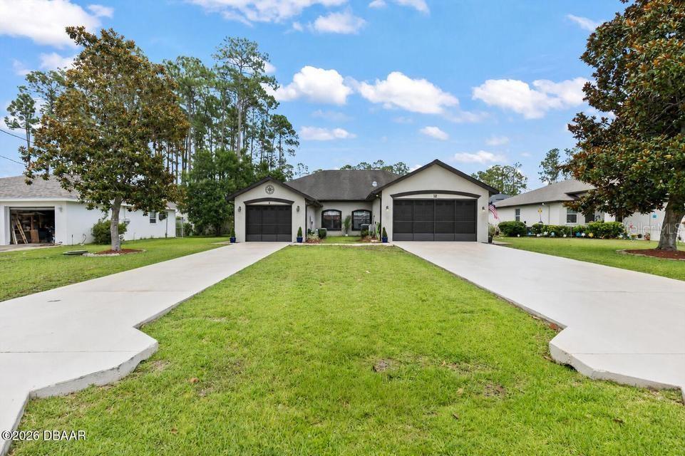 Opportunities like this are hard to find. Offered for sale as a complete duplex, this property features two spacious units, private fenced yards, separate garages, and endless possibilities for investors, owner-occupants, or multi-generational living. Live in one side and collect rental income from the other, add a strong asset to your portfolio, or keep both units as income-producing rentals. Unit A offers 1,207 square feet with 2 bedrooms, 2 bathrooms, a one-car garage, and an open, comfortable floor plan. The kitchen flows into the dining area and expansive living room with volume ceilings, creating a bright and airy space. The primary suite includes a private en suite bath, while the guest bedroom is conveniently positioned near a full bathroom and indoor laundry area. Outside, enjoy a screened porch overlooking the fully fenced backyard. Unit A is currently leased through July 31, 2026, providing immediate income from day one. Unit B offers 1,488 square feet with 2 bedrooms, 2 bathrooms, a two-car garage, and a split-bedroom layout designed for privacy. The spacious primary suite features a large en suite bathroom, while the guest bedroom is located near a second full bath. Volume ceilings enhance the open-concept living, dining, and kitchen areas, creating a welcoming space for everyday living and entertaining. What truly sets this unit apart are the two additional flex spaces, giving you room for a home office, gym, craft room, playroom, media room, or whatever fits your lifestyle. A Florida room overlooks the private fenced backyard, adding even more usable living space. With strong income potential, desirable floor plans, private outdoor spaces, and the flexibility to live, rent, or do both, this duplex offers the kind of versatility that's increasingly difficult to find in today's market. All information taken from the tax record, and while deemed reliable, cannot be guaranteed.