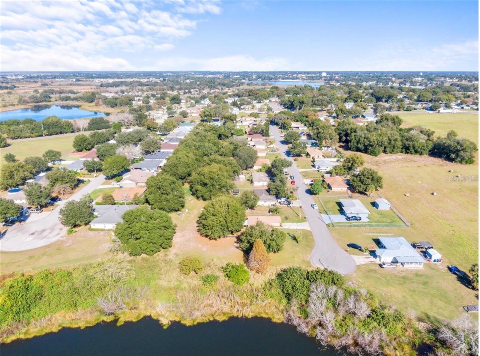 Build your dream home on this residentially zoned lot in the growing city of Haines City! This unique parcel offers a peaceful setting with water frontage/access to Engineers Lake, providing a scenic backdrop and added privacy. Conveniently located near shopping, dining, schools, medical facilities, and major roadways, this property combines tranquility with accessibility. Whether you’re looking to build a primary residence, a vacation home, or invest in one of Central Florida’s fastest-growing areas, this lot offers endless potential. No HOA and plenty of room to create the home you’ve always envisioned. Don’t miss this opportunity to own a piece of Florida living!