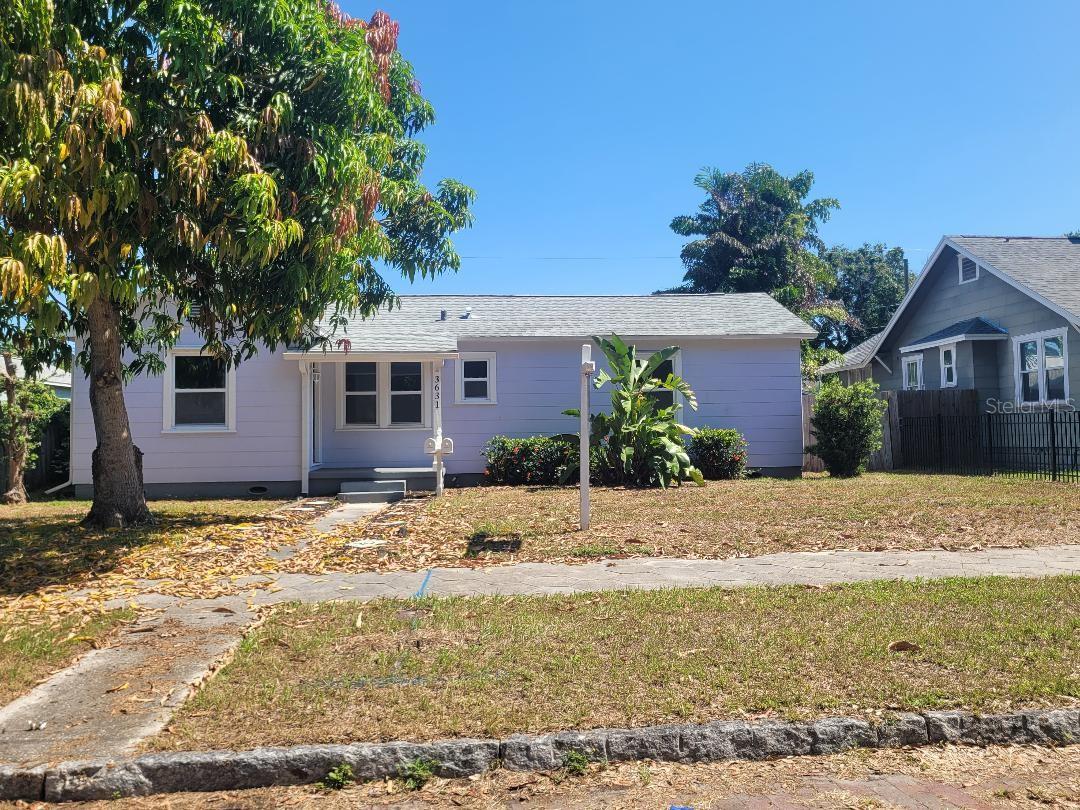 INCOME PROPERTY. THIS PROPERTY HAS A FULLY PERMITTED SEPARATE ADU. THIS IS NOT A FLIP! THIS HOME WAS IMPECCABLY REMODELED, AND CONTAINS A FULLY-PERMITTED ADU BUILT IN 2021. New roof installed as well in 2021, hurricane impact windows, aluminum gutters, and deck; new central A/C in 2024, new insulation in attic and a skylight in kitchen for added illumination, large lot over 8500 sq feet. Tented for termites 2024 (in garage). Units have separate electrical meters, main house and cottage share water meter with meter service to ADU. HIGH AND DRY! Discover the income potential with this property! Two separate units on a large lot. This property is located within minutes of downtown and the beaches. Perfect for investors seeking rental income or buyers interested in occupying the main home while generating income from the ADU (or vice versa), this property provides a world of possibilities in St. Pete. Beautifully renovated 2 bedroom 2 bath 1941 home with small office area/bonus room. This property includes a detached 1 bedroom 1 bath fully permitted Accessory Dwelling Unit built in 2021. The main home is situated at the front of the property facing brick lined streets on 4th Ave North . The main home features beautifully restored original oak floors, new tile in office and kitchen, granite countertops, new stove, refrigerator, dishwasher, garbage disposal, range, microwave, both baths renovated, large yard with mango tree separated by fence from ADU. ADU was built to category 4 Hurricane code in 2021 and is 600 square feet. Efficient floor plan that includes a full bath and a spacious utility room that includes a stacked washer/dryer and some storage. Tile throughout, granite countertops, central a/c. Cottage was designed with front entrance facing the rear alley access to provide total privacy from the front home. Designated parking space adjacent to the cottage makes this a perfect extended family property or an investment opportunity. Parking pad for front house. Room sizes to be verified by buyer.