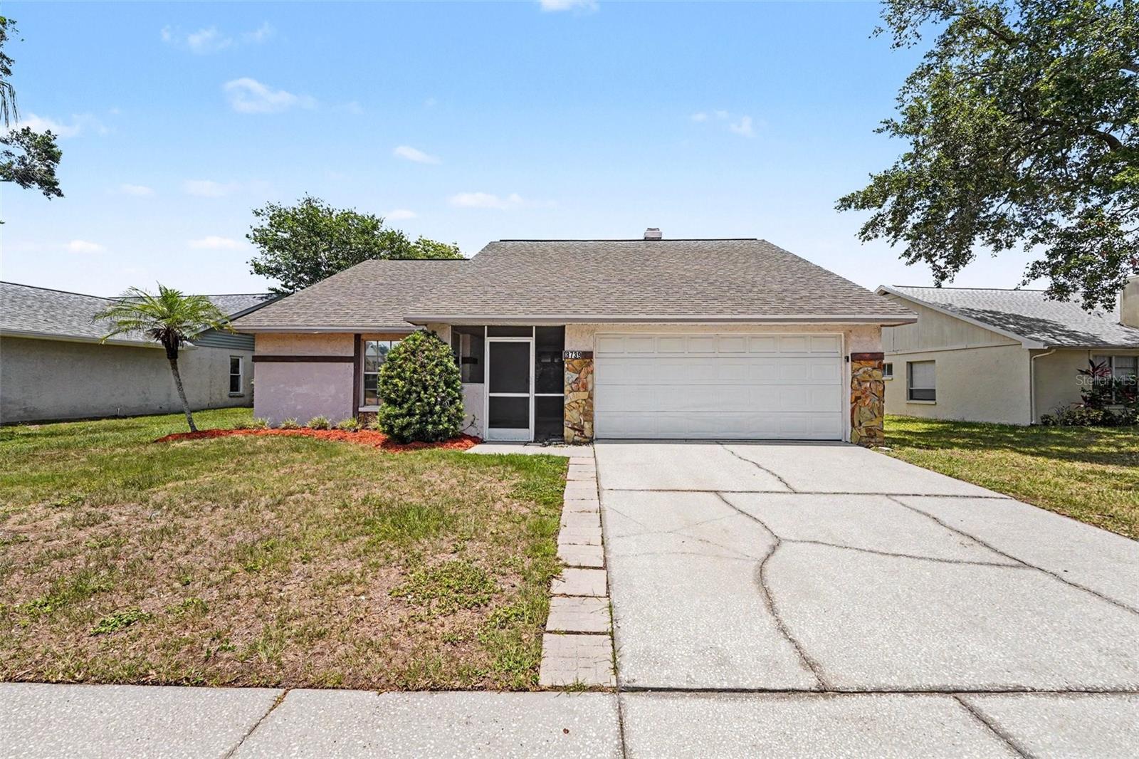 Welcome to this wonderful 3-bedroom, 2-bathroom home located in the desirable Copperfield Unit neighborhood.The inviting interior features a sought after floorplan that allows for a seamless flow between the main living spaces. A cozy fireplace serves as the perfect centerpiece in the living room for relaxing evenings. Overlooking the living area, the updated kitchen boasts beautiful granite countertops and sleek stainless steel appliances, making it a functional and stylish space for cooking and entertaining. The spacious primary bedroom features a private, ensuite bath and walk-in closet. Step out back to find a fully fenced-in backyard, offering an excellent space for outdoor dining, gardening, or weekend get-togethers.Conveniently positioned just minutes from major highways including the Veterans Expressway and I-275, this home provides easy access to Tampa International Airport, International Plaza, and the Westshore Business District. This prime location also places you right near top-rated medical facilities, shopping centers, dining options, and the vibrant atmosphere of Downtown Tampa.  Schedule your private showing today!