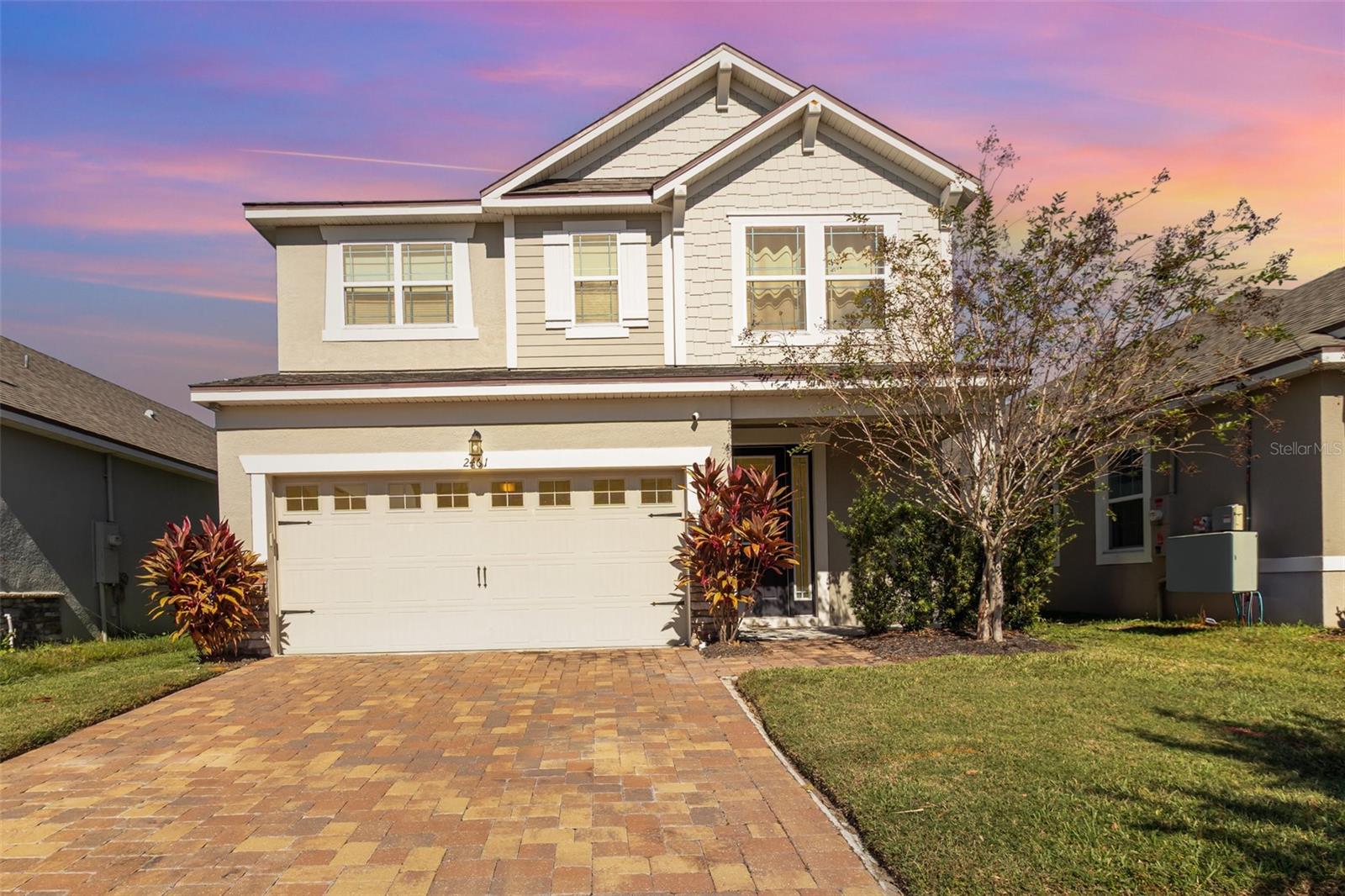 Don't miss this beautiful two-story home in the centrally located gated community of Tapestry. Upon entering you will be welcomed by a modern open floor plan. The combination of the living/dining/kitchen space is ideal for gatherings and entertainment. The chef in the family can cook, enjoy a glass of wine and have guests gather around the kitchen island. You will appreciate all bedrooms on the second level, offering additional privacy. A spacious loft on the second level creates additional flex space for movie night, game room or office. The primary suite offers a walk-in closet and an en-suite bath with walk-in shower and private commode. What a perfect place to unwind at the end of a long day of work or play! You can relax in the comfort of the screened enclosed back porch while enjoying your morning cup of coffee or an evening libation! Tapestry is a 24-hour manned gated community offering high security, but there are plenty of amenities for everyone in the family including a resort-style pool, gym, activity room, playground, dog park, scenic walking trails, and much more. This location will give you easy access to shopping, dining, area major theme parks, and major roads (Osceola Pkwy, 417, FL Turnpike). This property is a must see!!!