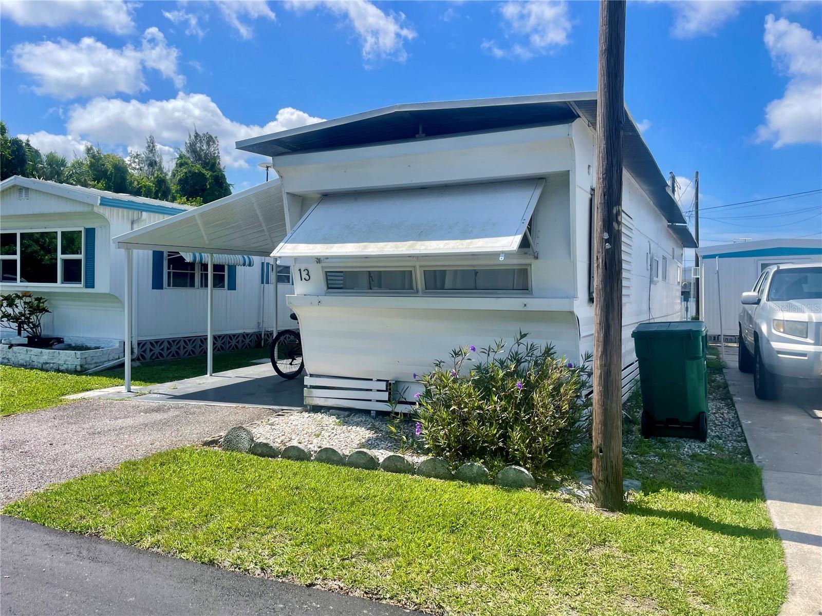 Welcome to lovely Jet Park! Jet Park is a great low key, active 55+ community located in a great central location of Palmetto. This adorable home is the perfect little get away when you need to get out of the cold or just need a break and want to relax in Florida.  Beautiful woodwork in the kitchen that offers all the amenities you need! Middle room could be used as a guest bedroom, office or craft room.  

Close to shopping, restaurants, groceries and many major thoroughfares. Low monthly fees of only $195 a month.  Jet Park has a boat ramp for the residents which gives you direct access to the Gulf from the Manatee River. There is also a picnic area with fire pit, kayak launch, shuffleboard, pool, full clubhouse with kitchen.