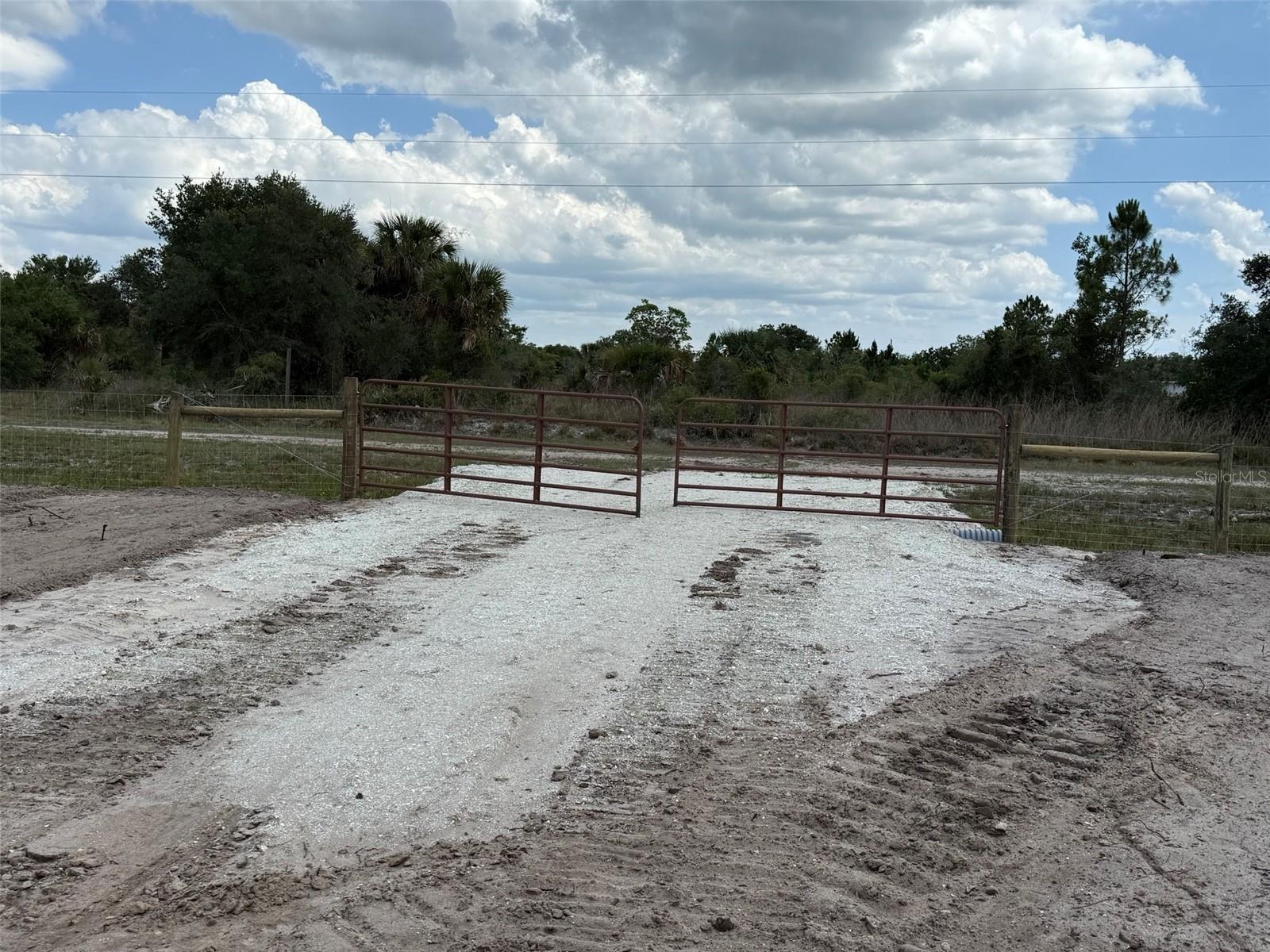 Cleared and fully fenced 1.25-acre lot with a gate and culvert already installed, making it ready for your plans. Whether you're looking to build your dream home, bring a new mobile or manufactured home, or invest for the future, this property offers plenty of potential. Located in a growing area of Okeechobee, you'll enjoy the privacy of country living with room for animals, RVs, boats, gardens, and more. With no HOA and plenty of space to create your ideal setup, this is a great opportunity to buy now and build later while the area continues to grow. Don't miss your chance to own a piece of Florida land with improvements already in place.
