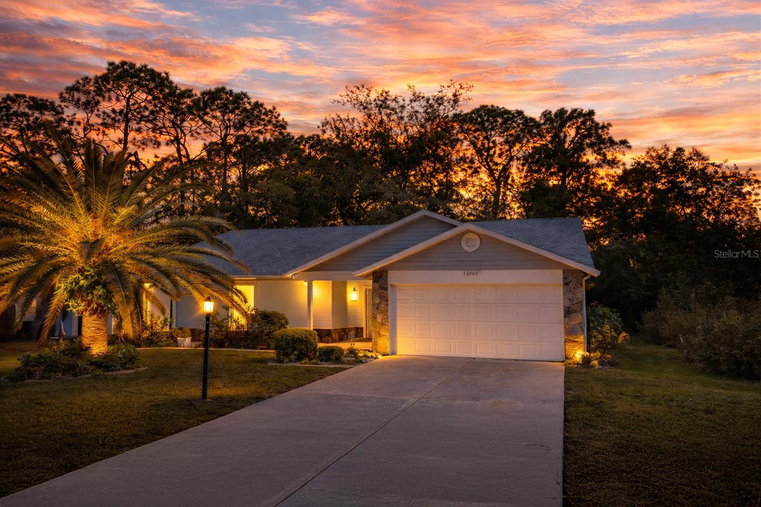 Welcome to easy Florida living in the highly sought-after 55+ community of Timber Pines! This well-maintained 2-bedroom, 2-bath, 2-car garage home offers 1,128 sf of comfortable living space and is the perfect opportunity for full-time residents or seasonal buyers. Built in 1983, the home features brand new carpet throughout, giving it a fresh, move-in-ready feel the moment you walk in. Peace of mind comes with major updates already completed, including a 2019 roof and a 2014 air conditioning system, helping with both insurance and long-term value. The functional floor plan offers a spacious living area, a bright kitchen, and well-sized bedrooms, ideal for everyday living or hosting guests. Step outside and enjoy the lifestyle that makes Timber Pines so desirable. This gated, amenity-rich community offers multiple golf courses, clubhouse, pools, fitness center, tennis courts, pickleball courts and a full calendar of social activities--all designed to keep you as active and engaged as you want to be. Conveniently located near shopping, dining, medical facilities, and Florida's beautiful Adventure Coast, this home is your chance to enjoy low-maintenance living in one of Spring Hill's premier active adult communities. Don't miss your opportunity to live the Timber Pines lifestyle--schedule your private showing today!