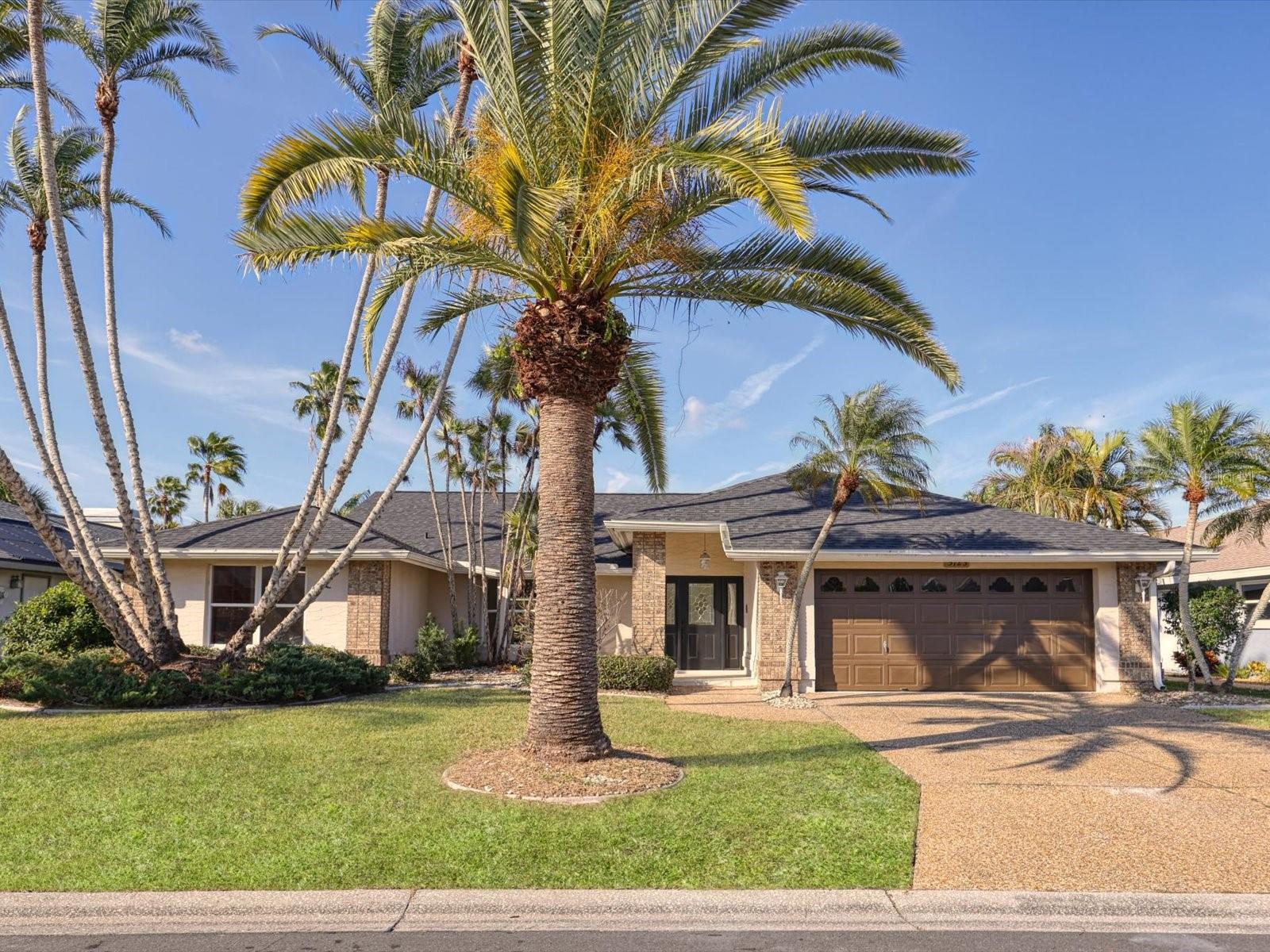 Move in ready with an open-concept floorplan. Perfectly positioned on a quiet cul-de-sac with a New Roof in 2025, this home sits just a wedge shot from the 15th hole of one of the most enjoyable courses on the Gulf Coast. Once inside you’re immediately greeted by a dramatic view of the expansive lanai with new deck surface through a solid wall of glass. This seamless indoor-outdoor connection creates the ultimate entertaining space — plumbed for an outdoor kitchen, sparkling swimming pool with new pool pump (2025), and relaxing hot tub. It’s easy to imagine hosting friends in the nearly 20' x 26' vaulted living room, featuring updated tile flooring and a convenient dry bar — all while staying connected to the outside. The formal dining area flows effortlessly from the living space, offering just the right amount of separation from the activity in the kitchen.  The kitchen itself is smartly laid out for efficiency, making it easy to entertain with new countertops and updated cabinet hardware. The split primary suite provides a private retreat, complete with an ensuite bath, and a versatile flex room with a wall of built-ins — ideal as a home office, reading nook, or additional bedroom. The bones, layout, and location make it a standout opportunity. With a few personal touches, this property has the potential to become your perfect Gulf Coast escape. Where golf course living meets laid-back Gulf Coast charm. Experience everything that makes Peridia so special at Peridia Golf & Country Club—home to what many consider the area’s premier 18-hole executive golf course. Beyond the beautifully maintained fairways, you’ll enjoy a full clubhouse experience featuring tennis and pickleball courts, exceptional dining options, and a delightful Sunday brunch. Be sure to stop by the famous Peridia Tiki Bar— for relaxing drinks and a vibrant social atmosphere. Perfectly situated, Peridia offers convenient access to the best of the Gulf Coast. Spend the day on the pristine beaches of Anna Maria Island or Siesta Key, explore the rich performing arts scene in Sarasota, and travel with ease via Sarasota-Bradenton International Airport (SRQ) or Tampa International Airport. Minutes from the famous UTC Mall. Easy to show and full upgrade list available upon request.