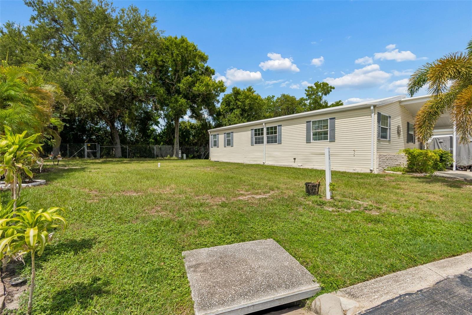 Build the Florida home you've always dreamed of on this rare vacant lot in the highly sought-after Clearwater Cascades, a resident-owned 55+ five-star community. This prime homesite offers the perfect opportunity to design a brand-new manufactured home in one of Clearwater's most desirable active adult communities. This unique Lot is larger and with no rear neighbors!

Enjoy an exceptional resort-style lifestyle with outstanding amenities, including two heated swimming pools, a relaxing hot tub, sauna, spacious clubhouse, fitness center, and shuffleboard courts. The community also features a full calendar of social events and activities, making it easy to meet neighbors and stay active year-round.

Conveniently located just minutes from shopping, restaurants, medical facilities, golf courses, and the beautiful Gulf Coast beaches, Clearwater Cascades offers the perfect blend of relaxation and convenience. Whether you're looking for a seasonal retreat or your forever home, this is a fantastic opportunity to own land in a resident-owned community where you can enjoy the very best of the Florida lifestyle.