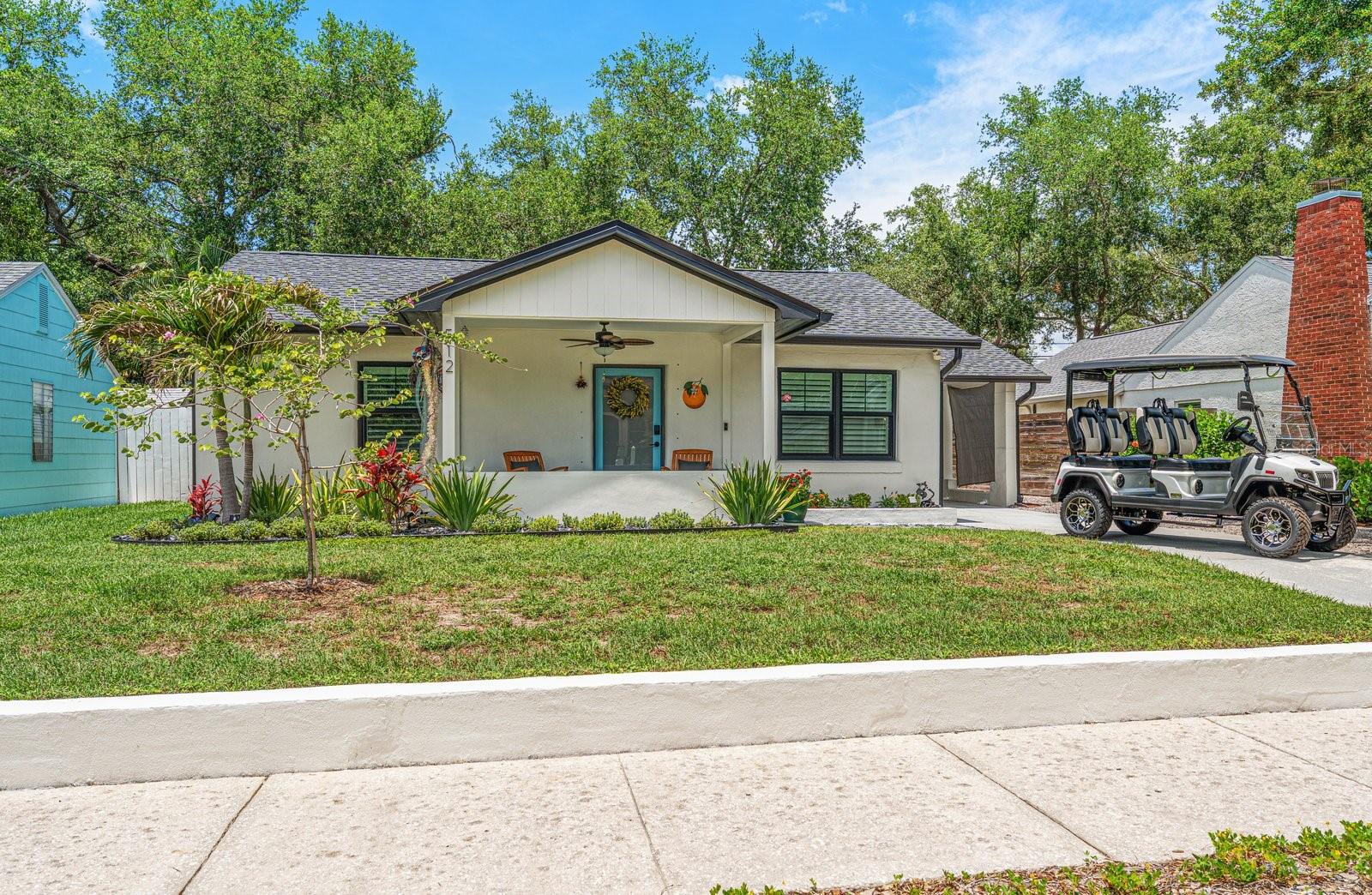 Located in the heart of Dunedin...Classic Dunedin charm meets modern luxury in this beautifully renovated bungalow, ideally located on the highly sought-after brick-lined streets of Dunedin in a golf-cart friendly neighborhood. Situated in a non-flood zone and just moments from the waterfront, Pinellas Bike Trail, Main Street dining and shopping, local breweries, and the stadium, this home offers the ultimate blend of lifestyle and location. Constructed with solid block construction, this residence has been thoughtfully remodeled from top to bottom, making it feel practically brand new. Extensive upgrades include PGT hurricane-impact windows, new rear window panes, newer roof and fascia, updated plumbing and electrical systems, and new rain gutters with Leaf Guard protection. Inside, elevated finishes and custom craftsmanship are showcased throughout. Wide-plank birch flooring flows seamlessly through the home, creating a warm and sophisticated aesthetic. The designer kitchen features custom white cabinetry, quartz countertops, tile backsplash, under-cabinet lighting, and a premium GE Café matte white appliance package. The beautifully renovated bathroom offers marble hexagon tile flooring, a custom vanity and cabinetry, updated fixtures, skylight, and a sleek glass-enclosed shower. Both bedrooms feature custom closet systems designed for style and functionality. Additional highlights include natural gas added in 2023, a Rinnai tankless gas water heater, plantation shutters, pleated and roller shades throughout, and quality improvements that reflect pride of ownership at every turn. BONUS: Adding to its unique appeal, the property is zoned for an ADU/in-law suite, offering exceptional flexibility and future potential. This home proudly features Dunedin's signature orange. Golf cart is negotiable.