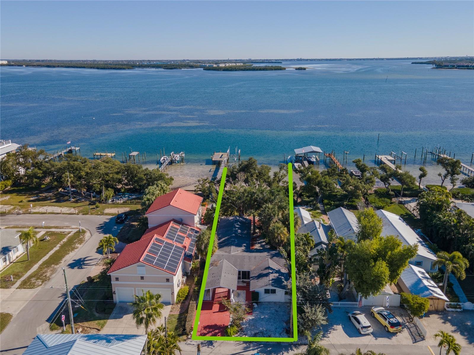BUILD YOUR BAYFRONT DREAM HOME...Gorgeous views of the bay & Intracoastal Waterway from this property on a quiet, serene street.  Home was remediated after the hurricanes of 2024 and is now a blank slate for a new owner to create their forever home on the water. This 2/2 home has good bones, vaulted ceilings and a nice floor plan to reinvent OR raze current structure to build a magnificent bayfront home on Anna Maria Island. Ideally situated right on the bay and just a short stroll to the beach with easy access... Waterfront parcel, PI#74413.0010/9 will convey with this sale.