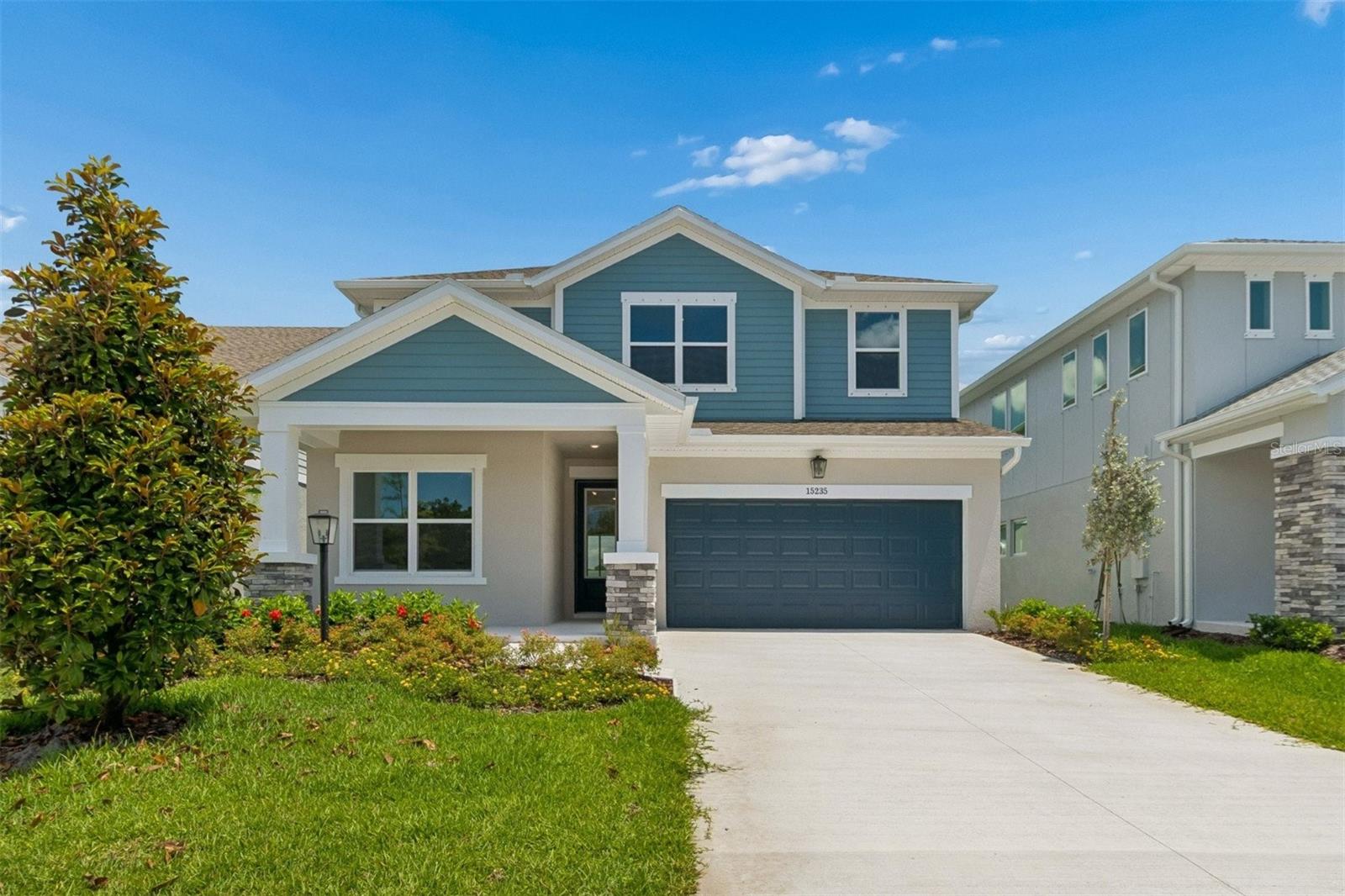 Experience the Bradson, nicknames, "The Brahma Bradson," because it's such a big strong looking home!  This is where thoughtful design meets everyday comfort in one of Bradenton's newest communities, "Eastlyn" by the multi award winning builder, "David Weekley Homes." This spacious two-story home offers 2,719 square feet with 4 bedrooms, 3 baths, and an enclosed study with stylish French doors, perfect for a private office or quiet retreat. Walking into the family room you experience the "Life Design" concept David Weekley Homes is famous for, as you look across the large open sight lines to the kitchen and dining room. And what a kitchen it is, featuring an electric cooktop, built in oven/microwave combo, a huge island topped with sleek quartz countertops with all the room you need to entertain or to enjoy a relaxing quiet meal. Beautiful laminate flooring throughout the first floor and the large 12 foot sliding glass doors create an elegant, airy atmosphere. Step outside to a generous lanai that extends your living space, providing the perfect spot for outdoor dining, morning coffee, or gatherings with friends. Upstairs, the spacious Owner's Retreat is designed for relaxation, complete with a luxurious Super Shower in the Owner's Bath. A versatile retreat area offers additional space for a media room, playroom, or second living area. Located in the No CDD Fee community of Eastlyn, you will enjoy a quaint neighborhood of 75 homes with convenient access to I-75. Built with David Weekley quality, every Bradson home also includes a 1-2-10 Builder’s Warranty, giving you confidence and peace of mind.