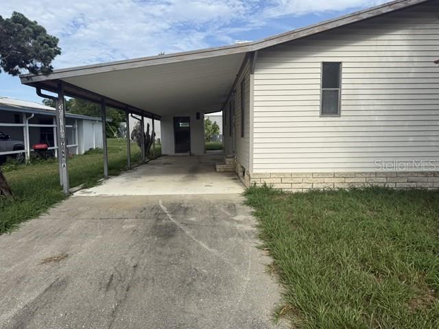 Investor Special! Great opportunity to restore this double-wide manufactured home situated on its own lot in an established Zephyrhills community. The property is in need of repairs and updates and is being sold AS-IS, making it ideal for investors, renovators, or buyers using renovation financing. With the right improvements, this home offers excellent potential as a primary residence, rental property, or resale investment. Conveniently located near shopping, restaurants, medical facilities, parks, and major highways. Bring your vision and transform this property into a valuable asset. Don't miss out!