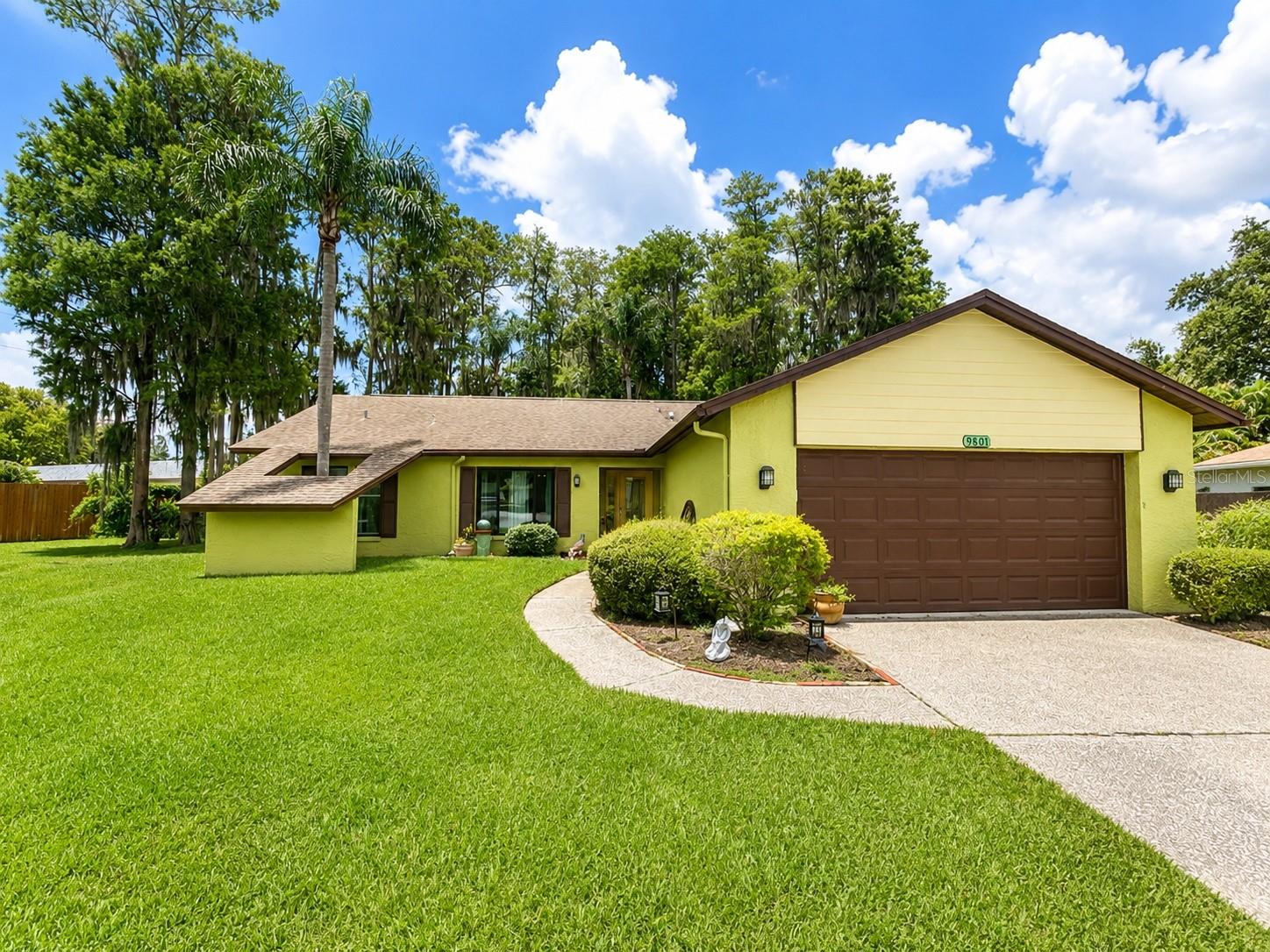 Welcome to 9801 Didrikson Drive—a stunning, elegant home in an established New Port Richey neighborhood near Trinity Hospital! This spacious residence offers 3 bedrooms (with a large office that can serve as a 4th), 2 baths, and two family rooms, providing ample living space. Freshly painted inside and out it features new luxury vinyl plank flooring, solid countertops, and stainless steel appliances. A formal dining room complements the breakfast area. The 2018 roof includes beautiful skylights, and the impact-resistant windows remain under warranty. The home boasts a brand-new 4-ton A/C unit and an inviting in-ground pool surrounded by mature tropical landscaping. Plus, with top-tier schools and fantastic dining nearby, this is a phenomenal location to call home.