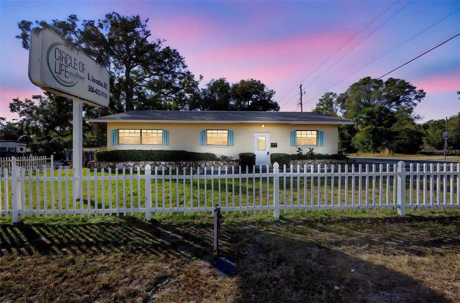 Prime commercial space on Hwy 17-92 in Orange City, zoned B-4 with many permitted uses. Move-in ready block building on a high-visibility corner lot. Interior includes reception area, two front offices, conference room, large rear room, storage, and two half baths. Former real estate and chiropractic office. Five parking spaces with room to add two more. Great location for professional or service-based businesses.