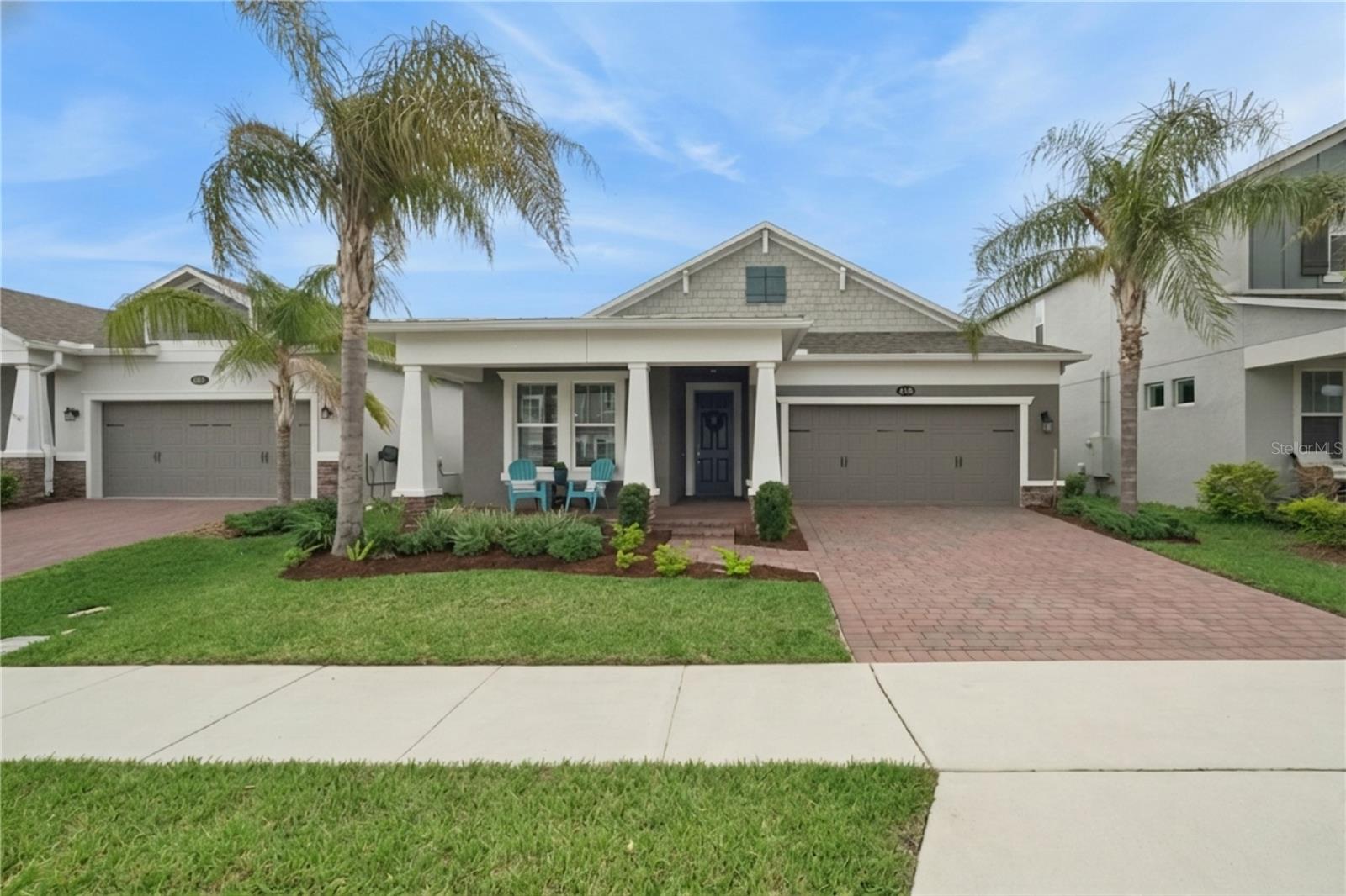 Enjoy the best of Florida Living in the most popular M/I Homes Richmond floor plan with a spacious bonus room, located in the desirable Hull Island community in Oakland. Just steps from the WEST ORANGE TRAIL, you'll enjoy easy access to biking, walking, and outdoor recreation minutes from your doorstep.
This exceptional 4-bedroom, 4-bathroom home offers a thoughtfully designed layout with all bedrooms and primary living spaces conveniently located on the first floor. Upstairs, the expansive bonus room w/balcony provides incredible flexibility and includes its own full bathroom, making it ideal as a media room, game room, home office, guest suite, or multi-generational living space.
Quality upgrades are evident throughout the home, including tile flooring in the main living areas and new luxury vinyl plank flooring in all bedrooms, on the staircase, and in the bonus room. The gourmet kitchen features beautiful quartz countertops, GE stainless steel appliances, a gas range, designer lighting, and a walk-in pantry. The primary bathroom has also been tastefully upgraded.
Recent improvements include an extended paver patio, French drain system, gutters, and a UV light added to the HVAC system for enhanced air quality and comfort.
Relax on the welcoming front porch or rear balcony and enjoy partial views of the lake. Combining stylish upgrades, functional living space, and an unbeatable location, this move-in-ready home offers the best of Florida living in one of Oakland's most desirable communities, and a perfect place to call HOME!   Please call to schedule your private showing.
