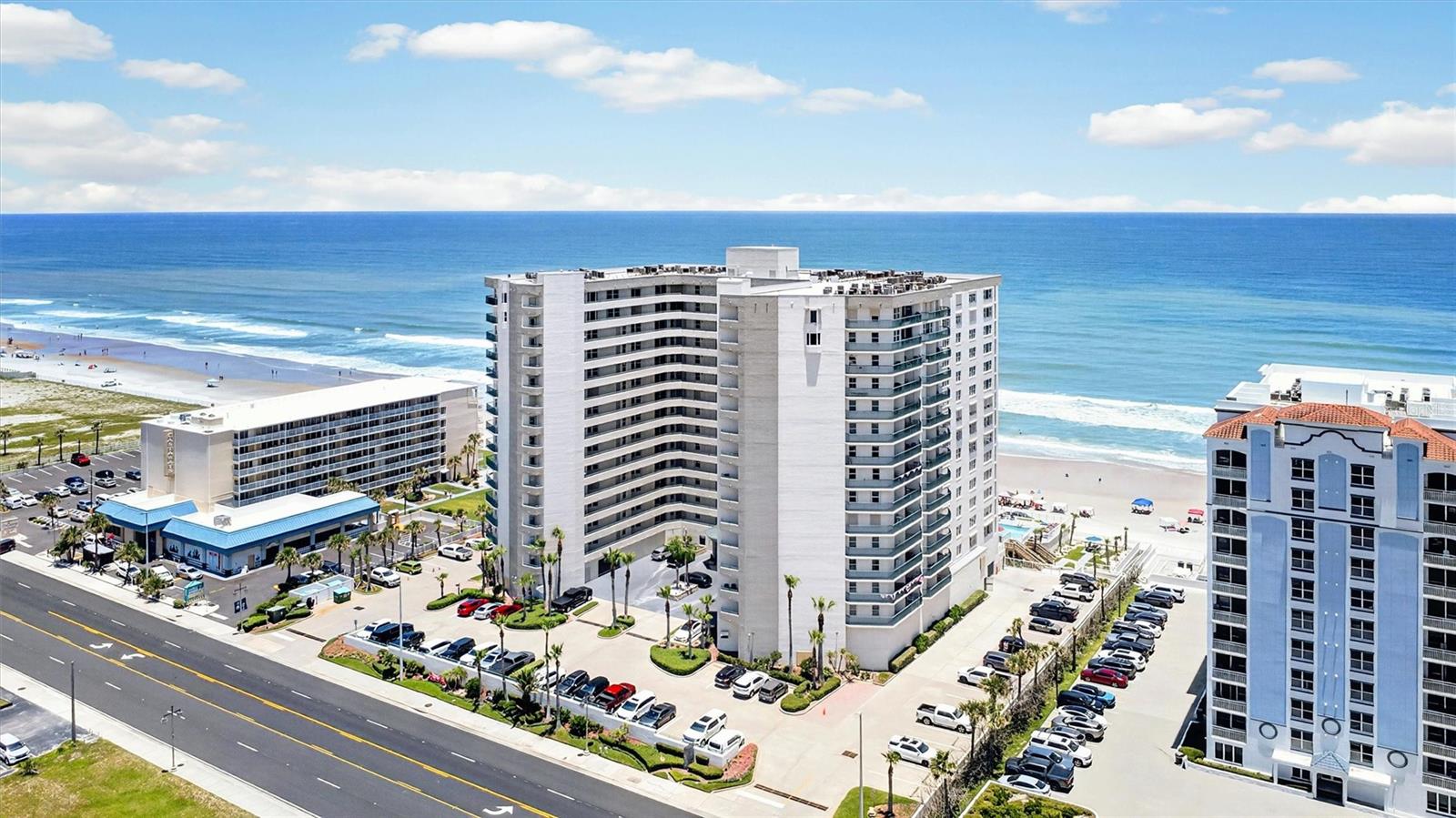 Welcome to 2055 S Atlantic Avenue #603, a direct oceanfront end-unit residence where every room enjoys sweeping ocean vistas.
Step inside to a large and versatile foyer that leads to an UPDATED KITCHEN showcasing sleek European backlit cabinetry, sparkling quartz countertops, and a BUTLER'S PANTRY that provides exceptional storage and effortless entertaining. Beyond the kitchen, the expansive sun-drenched living and dining area opens to a GENEROUS OCEANFRONT BALCONY, your daily oasis for dolphins at daybreak and moonlit tides at night. Three well-proportioned bedrooms and three full baths offer an abundance of privacy and comfort with the primary suite situated directly oceanfront and having balcony access. An exceptionally LARGE LAUNDRY ROOM with additional storage adds a level of convenience rarely found in condominium living. Enjoy spectacular sunsets over the Intracoastal Waterway from your front entry with a PRIVATE SCREENED LOGGIA featuring two outdoor cabinets for beach-toy storage making sandy days a breeze. Additional upgrades and conveniences bring comfort and peace of mind including newly installed MOTORIZED HURRICANE SHUTTERS, WHOLE-HOME UV-C AIR PURIFICATION SYSTEM and a dedicated UNDERGROUND PARKING space. Resort-style amenities complete the experience with TWO HEATED OCEANFRONT POOLS with relaxing spas, a state-of-the-art FITNESS CENTER, 2 convenient DOG PARKS, an elegant club room, and an opulent lobby. Add to all this, a rare TWO-WEEK MINIMUM RENTAL POLICY and as an added bonus, bring your pets along; TWO PETS UP TO 60 POUNDS each, are welcome. Whether you're searching for a full-time residence, a luxurious vacation retreat, or an exceptional investment, this extraordinary oceanfront residence delivers the lifestyle and versatility today’s buyers are searching for. Schedule your private showing and experience the view and the feeling for yourself.