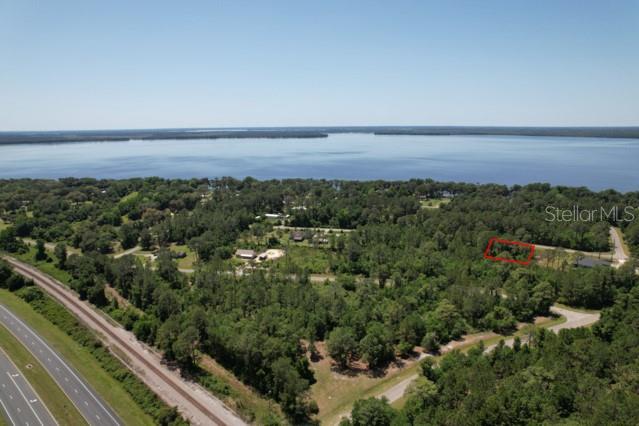 BRING ALL OFFERS! 1-+ acre buildable LOTS! Discover the epitome of Florida living on this vacant lot just moments from the shores of Lake Lochloosa. Home to some of the best fishing in Florida and so much more... Positioned mere minutes from Gainesville, home to the esteemed University of Florida, and within easy reach of Ocala, this parcel of land offers both convenience and tranquility. Other lots for sale. Please reach out for a VIP tour or for more details.