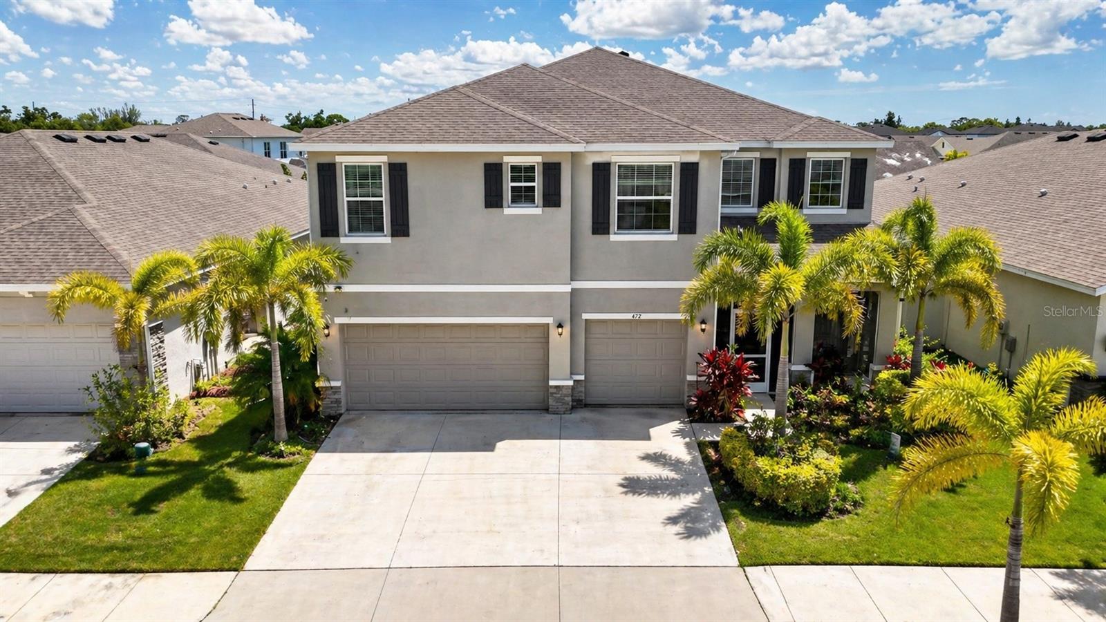 Welcome to this spacious 5 bedroom, 4 bathroom home in the heart of Ruskin offering comfort, functionality, and room to grow. With a 3 car garage and an inviting layout, this home is designed for both everyday living and entertaining. Step inside to find soaring high ceilings, tile and carpet flooring, and a bright living and dining room combination that flows seamlessly into the open living area.

The kitchen features stone countertops, ample cabinet and counter space, and a convenient dinette area overlooking the family room with a decorative fireplace, creating the perfect gathering space. A first floor guest bedroom and full bathroom provide flexibility for visitors or multi generational living.

Upstairs, the spacious primary suite showcases tray ceilings, a walk in closet, and an ensuite bathroom complete with double vanity sinks, a separate shower, and a relaxing garden tub. Just outside the primary suite is a versatile bonus room, along with three additional bedrooms and two full bathrooms.

Sliding doors lead to the screened lanai and fully fenced backyard, offering privacy and plenty of outdoor space to enjoy Florida living.

Residents of the community enjoy resort style amenities including a sparkling pool, playground, clubhouse, dog park, and basketball court. Conveniently located with easy access to I 75 and US 301, making commuting to MacDill Air Force Base, St. Petersburg, Tampa, Bradenton, and Sarasota a breeze. Nearby attractions such as E.G. Simmons Regional Park and Little Harbor offer opportunities for boating, fishing, camping, beach days, and enjoying Florida’s beautiful outdoors.