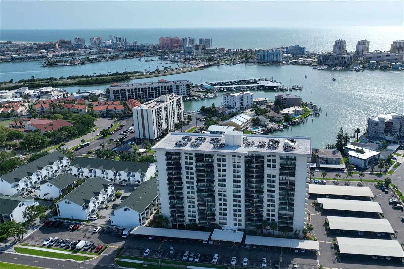 West facing direct water view! Welcome to this slice of paradise on the 10th floor of the Starboard Tower at Clipper Cove in Island Estates! This updated two-bedroom, two-bath condo offers 1,240 square feet with breathtaking west-facing views of the Mandalay Channel and Gulf of America from every room and the large balcony which overlooks the pool. Enjoy building amenities including a gym, pool, and recreational facilities. Plus, you're just an easy walk, bike ride or a quick hop on the Jolly Trolley to the beautiful shores of Clearwater Beach.