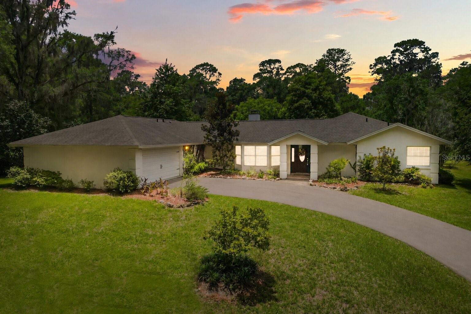 Experience the essence of Ocala horse country at this exceptional 17+ acre equestrian estate, ideally positioned just minutes from the World Equestrian Center (WEC) and HITS. Blending refined country living with thoughtfully designed equestrian amenities, this one-of-a-kind property offers the perfect setting for the competitive rider, professional trainer, or anyone seeking the tranquility and beauty of a private horse farm.

At the heart of the estate is an impressive 16-stall equestrian facility, featuring a 13-stall center-aisle barn complemented by an additional 3-stall shed row barn. Designed with both functionality and flexibility in mind, the barn offers matted stalls with movable walls, automatic waterers, hot water, and a new $25,000 electrical upgrade. Six half-acre cross-fenced paddocks provide generous turnout space, while the expansive grass field presents endless opportunities to create a custom jump field, dressage arena, or private riding track. With three RV hookup stations, the property is equally suited for hosting trainers, guests, or seasonal competitors. The property has also been successfully rented to tenants in the equestrian industry, offering proven income-producing potential and flexibility for owners looking to offset expenses or generate additional revenue.

The beautifully maintained 3-bedroom, 2-bath residence serves as a peaceful retreat, filled with natural light and surrounded by picturesque views of the farm. Inside, inviting living spaces and a cozy wood-burning fireplace create a warm, welcoming atmosphere, while the effortless indoor-outdoor flow makes entertaining easy. Outside, unwind by the screened, resurfaced pool, where you can relax and take in the quiet beauty of your surroundings after a day at the barn.

Thoughtfully maintained and extensively improved, the estate offers exceptional value and peace of mind. Recent updates include all new appliances (2024), a new pool pump and heater (2024), fresh interior and exterior paint (2025), new fencing, a brand-new limestone driveway, and 400 newly planted privacy hedges (2025). Additional infrastructure enhancements, including a roof replacement (2019), new well pump (2020), updated barn electrical, generator hookup, and three separate electric meters servicing the home, barn, and front gate, ensure the property is as practical as it is beautiful.

Whether envisioned as a private family farm, an elite seasonal show base, a boutique training operation, or an income-producing equestrian retreat, this extraordinary property offers a rare opportunity to embrace the very best of Ocala's world-renowned equestrian lifestyle. Bring your horses, bring your vision, and make this exceptional estate your own.