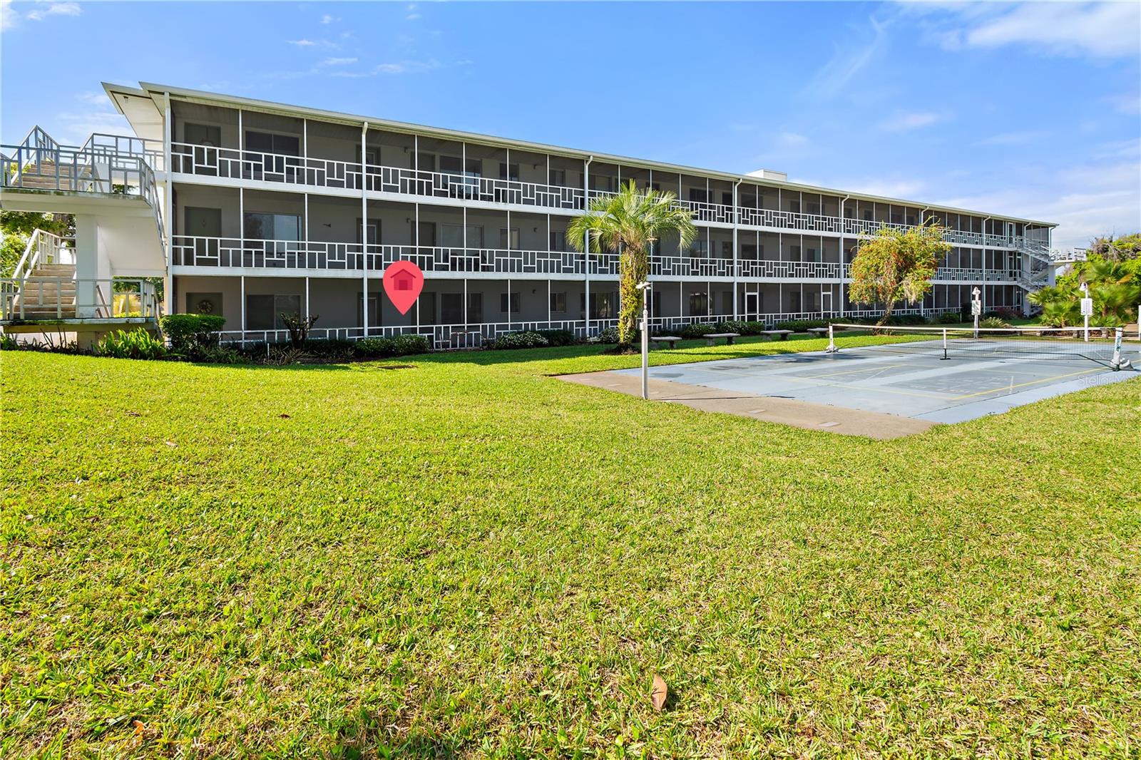 Welcome to easy, low-maintenance Florida living in this fully furnished 1 bedroom, 1 bathroom ground-floor condo located in the well-established Winter Haven Harbour community! Ideally positioned with direct views of the pool and shuffleboard courts, this unit offers both convenience and a relaxed lifestyle. Step inside to find a move-in ready space complete with living room furniture, bedroom furnishings, dining set, and a fully equipped kitchen. Many furnishings are brand new and have never been used. This is perfect for seasonal living, downsizing, or a full-time residence. The ground-floor location provides easy access with close proximity to elevators, laundry facilities, mailboxes, and the community bulletin board. Enjoy everything this quiet and well-maintained community has, including a resort-style pool, shuffleboard courts, clubhouse, fitness area, and multiple outdoor seating and gathering spaces. Each unit includes assigned covered parking and a dedicated storage area, along with additional guest parking available. The monthly association fee covers water, sewer, trash, grounds maintenance, and upkeep of all community amenities—making for truly stress-free living. Whether you’re a snowbird, retiree, or simply looking to simplify your lifestyle, this condo offers the perfect opportunity to enjoy Florida living at its best. Move right in as-is or you have the opportunity to update to your personal taste!