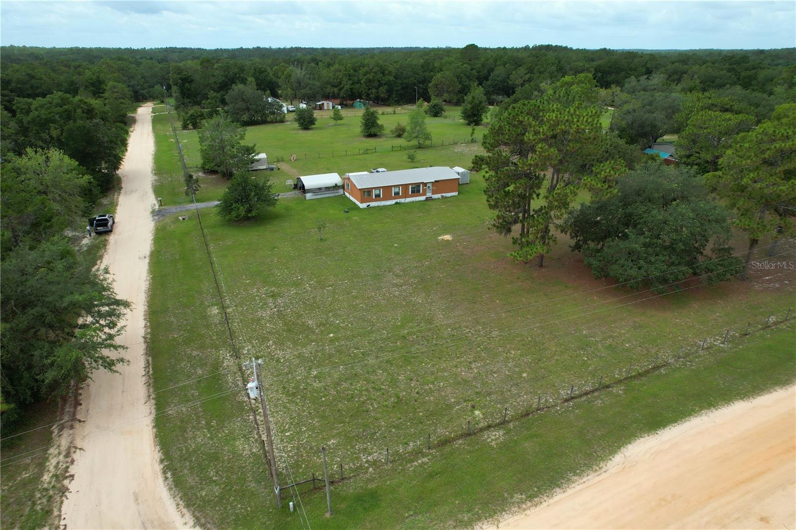Investor Opportunity on 3 Acres in Melrose! This 3-bedroom, 2-bathroom manufactured home offers incredible potential and is ready for your vision. Situated on 3 fully fenced acres of agricultural-zoned land, this property is perfect for those looking to create a private homestead, hobby farm, or investment property. Located in the desirable Ashley Lake Plantation community, you'll enjoy the peace and quiet of country living while remaining just minutes from everyday conveniences. Downtown Melrose, local restaurants, grocery stores, and shopping are just 5 minutes away. Bring your horses, goats, chickens, and other farm animals and take advantage of the freedom this property provides. With plenty of room to expand, garden, or simply enjoy the open space, this property offers endless possibilities for the right buyer. If you're looking for acreage, privacy, and a property with room to build equity, this Melrose gem is worth a look!