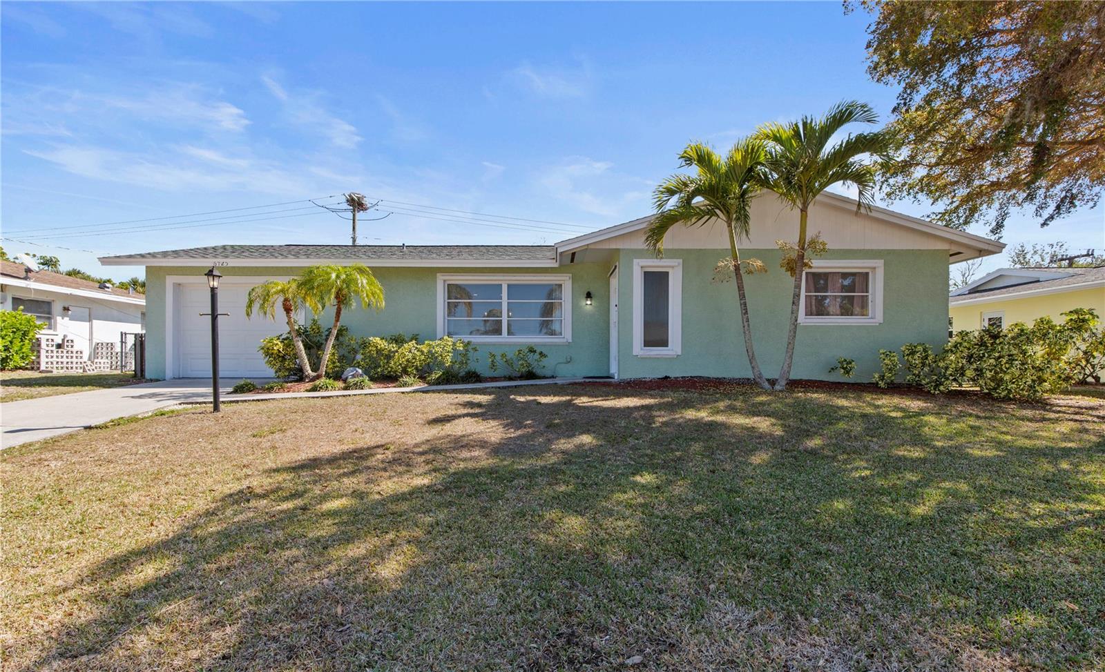 *NO FLOOD INSURANCE REQUIRED* This beautifully updated Gulf Gate residence is a true standout, offering the perfect blend of comfort, style, and high-impact upgrades. 

Step inside to a bright, open layout enhanced by crown molding, modern coastal lighting, and a fully remodeled kitchen designed for both everyday living and entertaining. The kitchen features granite countertops, upgraded stainless LG appliances (2022–2023), an induction range, convection microwave with air-fry capability, oversized refrigerator, and bar-height seating that keeps you connected with guests.

Major system upgrades provide exceptional peace of mind, including a brand-new roof (2024), new electrical panel (2021) with generator transfer switch, whole-house surge protection, EV charging outlet, hot water heater (2020), upgraded R25 attic insulation, and a smart attic fan. A new 2025 HVAC system with UV light enhances air quality and efficiency, while split AC units (2023) in the family room and third bedroom offer flexible climate control.

Both bathrooms have been tastefully updated with granite countertops, and additional features like a storm-rated garage door, clear storm shutters, Ring doorbell, and tri-fuel generator add an extra layer of security and convenience. The garage is thoughtfully equipped with built-in cabinetry, a laundry sink, and motion-sensor lighting.

Enjoy Florida living at its best with a spacious fenced backyard and paver patio, perfect for relaxing or entertaining.

Located in deed-restricted Gulf Gate, residents enjoy sidewalks, streetlights, and close proximity to shopping, dining, and the local library. You’re just minutes from Gulf Gate Village, Siesta Key Beach, Legacy Trail, top-rated schools, fitness centers, and the vibrant arts and theater scene of downtown Sarasota.

This is a move-in-ready home where the big-ticket items are already done — schedule your private showing today.