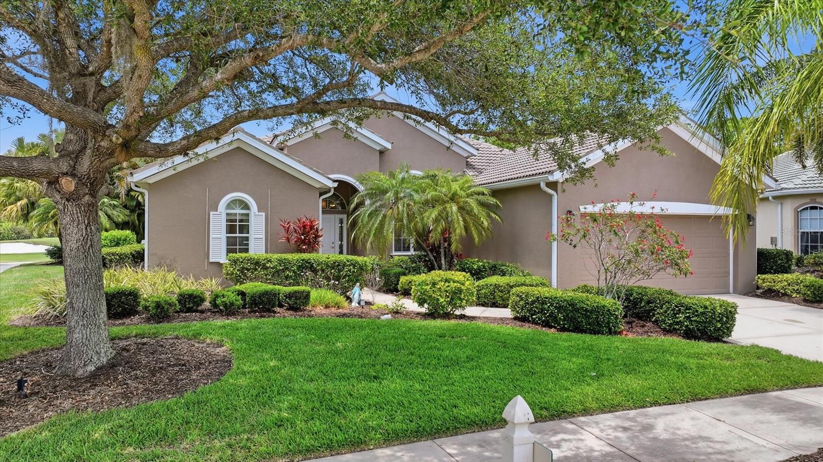 Positioned along the #2 green of Heron Creek’s Creek Course, this well-designed pool home offers the kind of space, layout, and lifestyle that buyers rarely outgrow. With 3 bedrooms, a large bonus room, and 2.5 baths, the floor plan balances open gathering spaces with privacy for both owners and guests. The kitchen features stainless steel appliances, light cabinetry, solid surface countertops, and an aquarium window overlooking the heated pool, lanai, and golf course beyond — a view that quietly becomes the backdrop to everyday living. The split-bedroom design places the generous primary suite apart from the guest rooms, with direct views of the pool and outdoor living area. 
One of the home’s most practical features is the dedicated half bath with direct pool access — something pool owners immediately appreciate. The oversized bonus room offers flexibility for a den, media room, office, or additional guest space depending on lifestyle needs.
Located just moments from Heron Creek’s elegant clubhouse, residents enjoy access to 27 holes of Arthur Hills-designed championship golf, tennis, fitness facilities, resort-style pool and spa, and both fine and casual dining within one of North Port’s premier gated golf communities. An active social calendar, beautifully maintained grounds, and golf cart-friendly access to nearby shopping, dining, and everyday conveniences make Heron Creek one of the area’s most desirable lifestyle communities. Beyond the gates, North Port continues to grow in popularity for its convenient location between Sarasota and Fort Myers, proximity to Gulf beaches, Braves spring training, boating, fishing, parks, and the expanding Wellen Park district with its dining, entertainment, and community events. No CDD fees and a Flood Zone X designation add to the overall value. Mandatory membership is available at three different price levels starting at $275/month. 
This is comfortable country club living without unnecessary complication — a home equally suited for full-time Florida living or a seasonal retreat. Please note and inform your buyers interior video cameras may or may not be on.