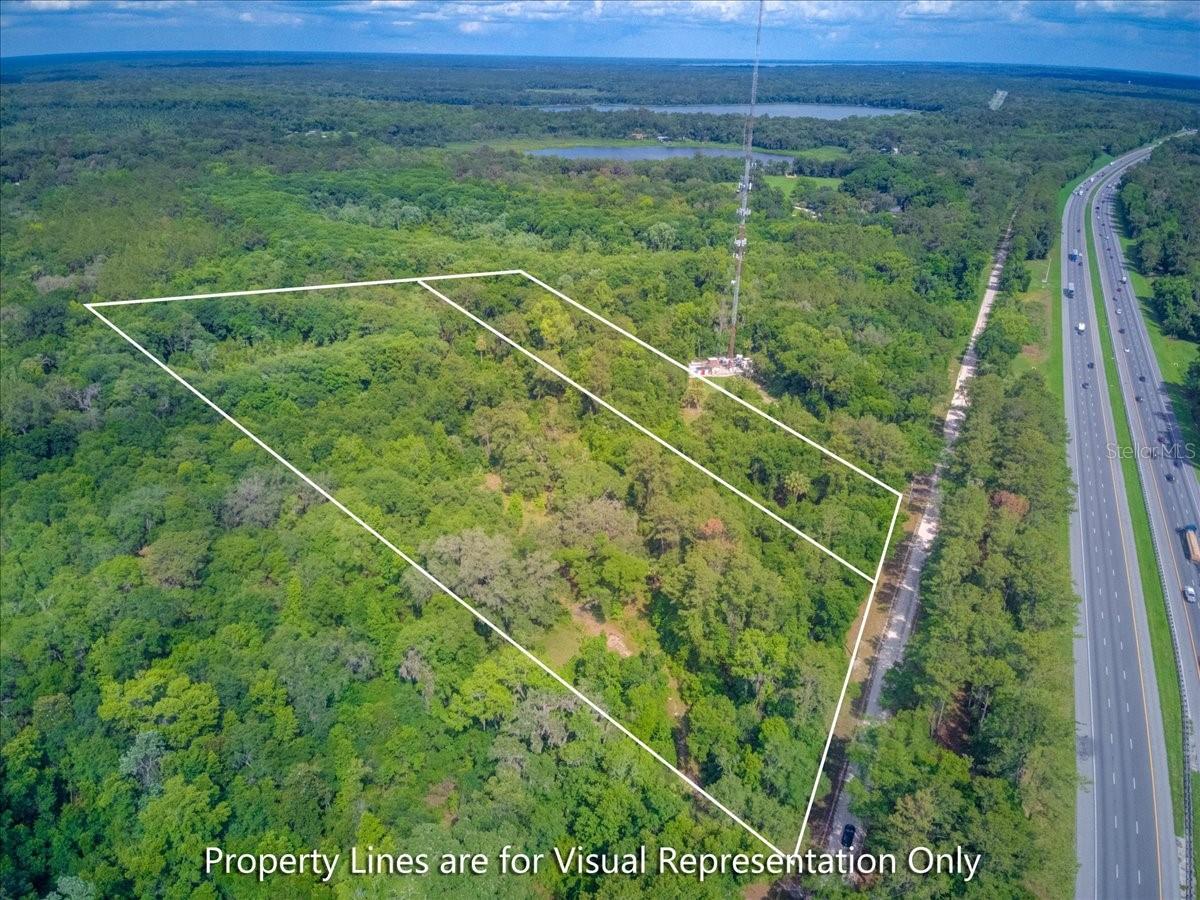 20 Acres of Opportunity in Micanopy, FL. Dual Parcel Sale (16400-000-000 and 16400-100-000) with Easy I-75 & US-441 Access. Here is your chance to own 20 acres of prime North Florida land in the heart of Micanopy, offered as two adjacent parcels (15 acres and 5 acres) sold together. Perfectly positioned near I-75 and US-441, this property offers effortless access to both Gainesville and Ocala, making it an ideal location for residential development, a private estate, or a long-term investment. Of the 20 acres, approximately 12 acres are buildable, while the remaining acreage offers a natural buffer, perfect for preserving Florida's native habitat and wildlife. The land will need to be cleared, giving the next owner a true blank canvas to bring their vision to life. Formerly home to AMIKids, an abandoned structure and an abandoned well are already onsite. Having infrastructure previously in place suggests that bringing utilities to the property may be less of a hurdle than a typical unimproved parcel, though buyers should conduct their own due diligence. The surrounding area features established residential homes, adding to the appeal for those looking to build in a community setting. Whether you are a developer, investor, or buyer dreaming of your own private retreat, this dual parcel offering checks the boxes on location, acreage, and potential. Two parcels. Twenty acres. Endless possibilities.