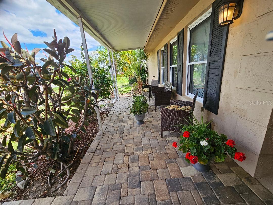 Come look at this Bahamian Model with 2 bedrooms, a den, 2 baths, a large screened lanai and a 2 car garage with a side entrance for your golf cart. The kitchen in this home has been updated with oak cabinets, granite countertops and a huge island. Kitchen aid dishwasher and range and a new refrigerator. The back splashes are travertine tile. Windows have been replaced with insulated vinyl.  New AC system 2026. This home is move-in ready. Sun City Center is like summer camp with over 200 clubs and activities for your enjoyment. You can drive your golf cart anywhere in town. This home is near so many of the wonderful community amenities that Sun City Center is known for. Sun City Center is an affordable and popular 55+ golf cart friendly community with activities and fun stuff to do, golf, tennis, pickle ball, softball, crafts, art, dancing. A fitness center, indoor lap pool, walking pool as well as a huge outdoor pool and spa. The Sun City Center Community Association membership fee is just $346 annually for each person for all of the community amenities, activities, Security Patrol, and FREE First Responder Service. This Golf cart friendly community offers easy access to shopping, banking, post office, medical offices, a hospital, community amenities, public golf courses, and more. Sun City Center is located in Southern Hillsborough County near I-75 and Highways 41 and 301 making it quick and easy to get to Tampa, St. Petersburg or Sarasota or numerous award winning beaches. Call for your personal showing today.