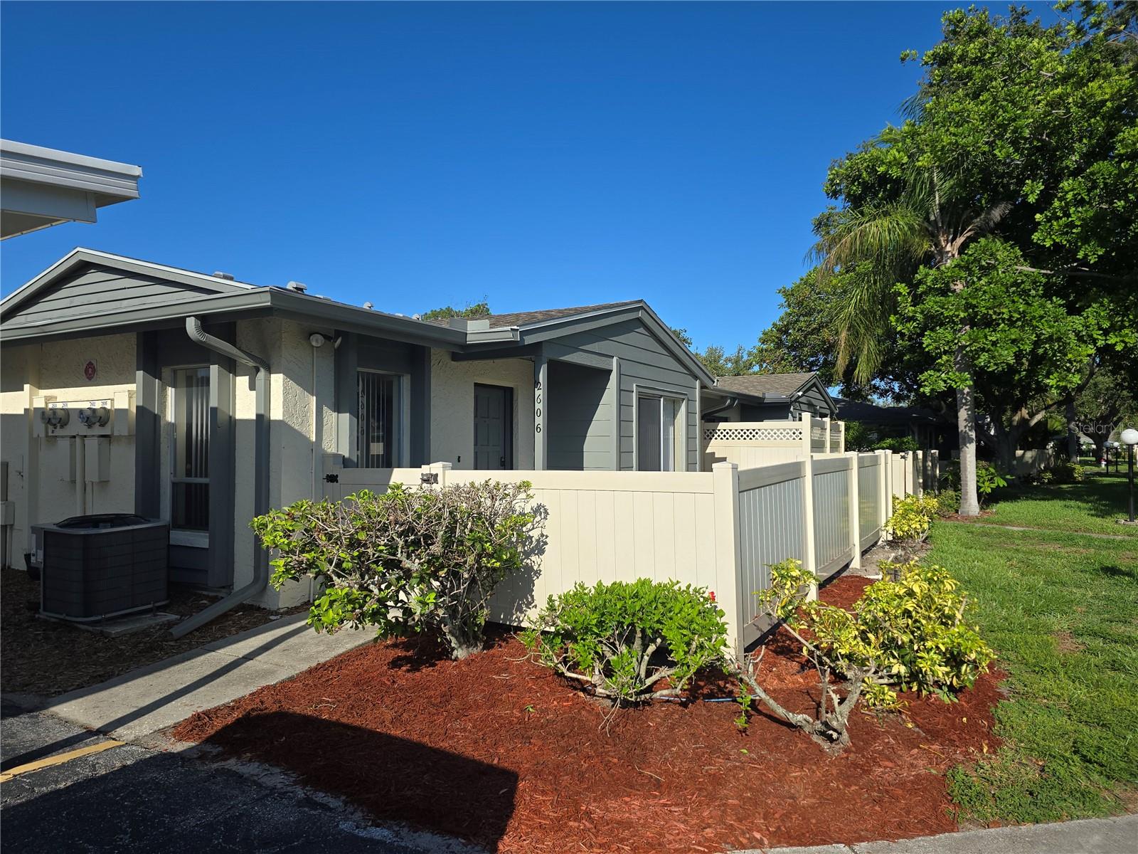 This updated 2 bedroom 2 bath condo is neat and clean and ready for you to move right in!!  This is a one story villa style condo with your assigned covered parking space right next to your front door!! Granite counters in the kitchen and baths. Crown molding throughout. The A/C was installed in 2022 and the roof is new in 2024. There is an indoor laundry room with a newer washer and dryer and the HWT is only 4 years old. There are two privacy fenced patios for your enjoyment. Two pets are allowed per unit- under 30 lbs each. Rentals are allowed with a 30 day minimum. Close to public transportation. Courtyard Square has a heated pool and a clubhouse. All lawn care and pest control as well as basic cable, internet, and wifi are all included in the monthly condo fee.  It is also located close to shopping, dining, golfing, fishing, hiking and  GT Bray Park. And you're less than 15 minutes from the world class white sandy beaches of Anna Maria Island!  Call today for your private showing!