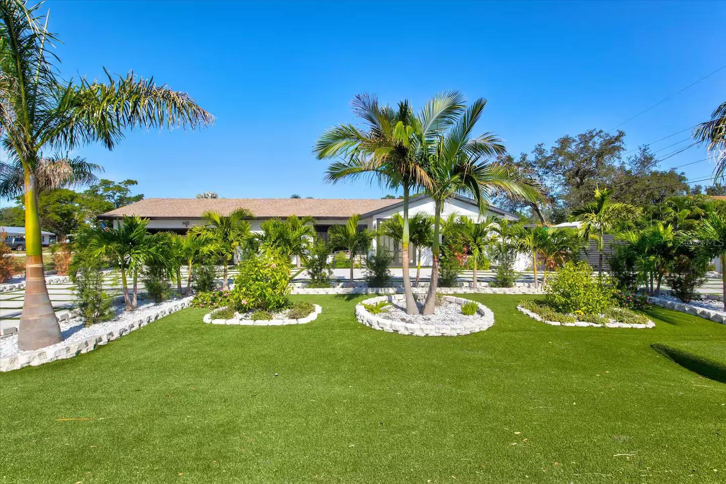 Discover the perfect blend of convenience and tranquility at our 3BR/2BA retreat. Nestled just a 6-minute drive from vibrant shops, restaurants, and cafes, you'll have the best of Bradenton at your fingertips.

Step into your private sanctuary as the sliding doors unveil a stunning backyard oasis. Lounge by the sparkling pool, rejuvenate in the inviting hot tub, and indulge in al fresco dining in your own outdoor haven. The well-maintained space includes an outside grill/bar set up with a TV and speakers, offering the perfect ambiance for hosting lively gatherings or relaxing evenings under the stars. This secluded escape is ideal for creating lasting memories with loved ones, blending tranquility with entertainment seamlessly.

Inside, an open floor plan welcomes you with abundant natural light, courtesy of hurricane impact doors and windows throughout. The spacious living area offers a serene atmosphere, while the chef's dream kitchen boasts sleek quartz countertops, stainless steel appliances, and ample storage—making every moment spent indoors as delightful as the surrounding outdoor paradise. Your retreat awaits, promising both comfort and convenience.