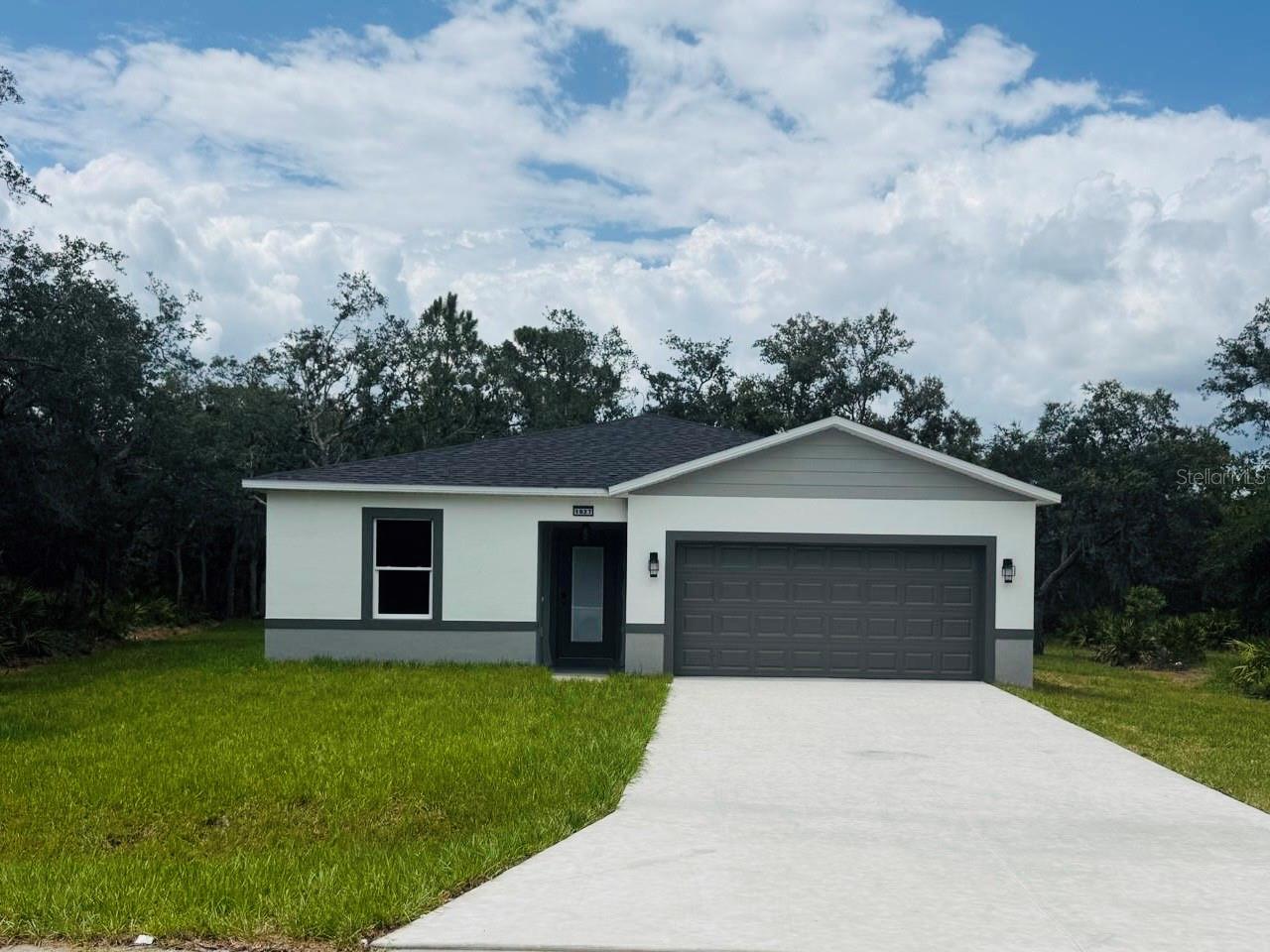 Brand-New Construction | Move-In Ready!
Welcome to this beautifully designed new construction home featuring 3 bedrooms, 2 bathrooms, and over 1,400 sq ft of thoughtfully designed living space. The open-concept layout offers a bright and spacious great room, a modern kitchen with quartz countertops, a large center island, and brand-new stainless steel appliances including an electric range, microwave, dishwasher, and garbage disposal.
The private primary suite features a spacious walk-in closet and an elegant ensuite bathroom with a beatifull sinks and a beautifully tiled walk-in shower. Luxury vinyl flooring flows throughout the home, while tray ceilings and contemporary finishes create a clean, modern feel.
Situated on a generous 0.23-acre lot with no rear neighbors, this home offers added privacy and plenty of outdoor space for entertaining, relaxing, or creating your own backyard oasis. Conveniently located near schools, shopping, dining, parks, and major roadways, this home combines quality construction with everyday convenience.
Don’t miss this opportunity to own a beautiful brand-new home in one of Central Florida’s fastest-growing areas!