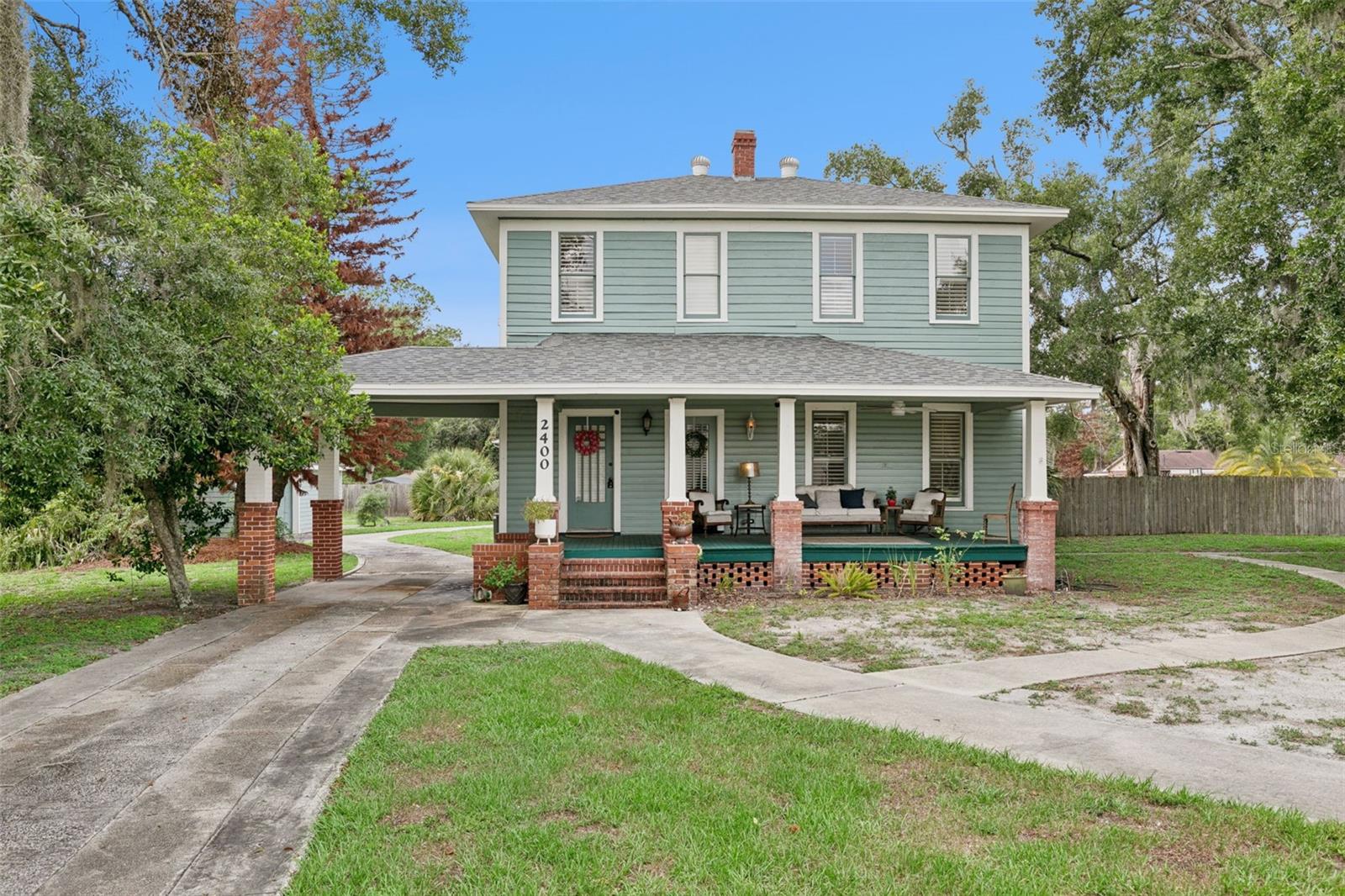 Welcome to 2400 S Park Ave, Sanford, FL 32771. This updated home has great charm, a spacious layout, and a large yard in a convenient Sanford location.

Inside, you’ll find bright living areas, beautiful wood floors, and comfortable rooms with plenty of natural light. The living room features an amazing fireplace that gives the home a warm and inviting feel. The kitchen has been updated with clean cabinetry, good counter space, and a practical layout.

The bedrooms are spacious, and the bathrooms have a fresh, updated look while still keeping some of the home’s original character. The large covered front porch is perfect for relaxing, and the yard offers plenty of outdoor space.

A major bonus is the huge detached three-stall garage, which is great for parking, storage, hobbies, tools, or a workshop. The garage is not fully shown in the photos, but it is one of the best features of the property.

This home is close to major roads, shopping, dining, schools, and downtown Sanford.

Highlights:

Updated home
Beautiful wood floors
Amazing fireplace
Large covered front porch
Spacious yard
Huge detached 3-stall garage
Great Sanford location