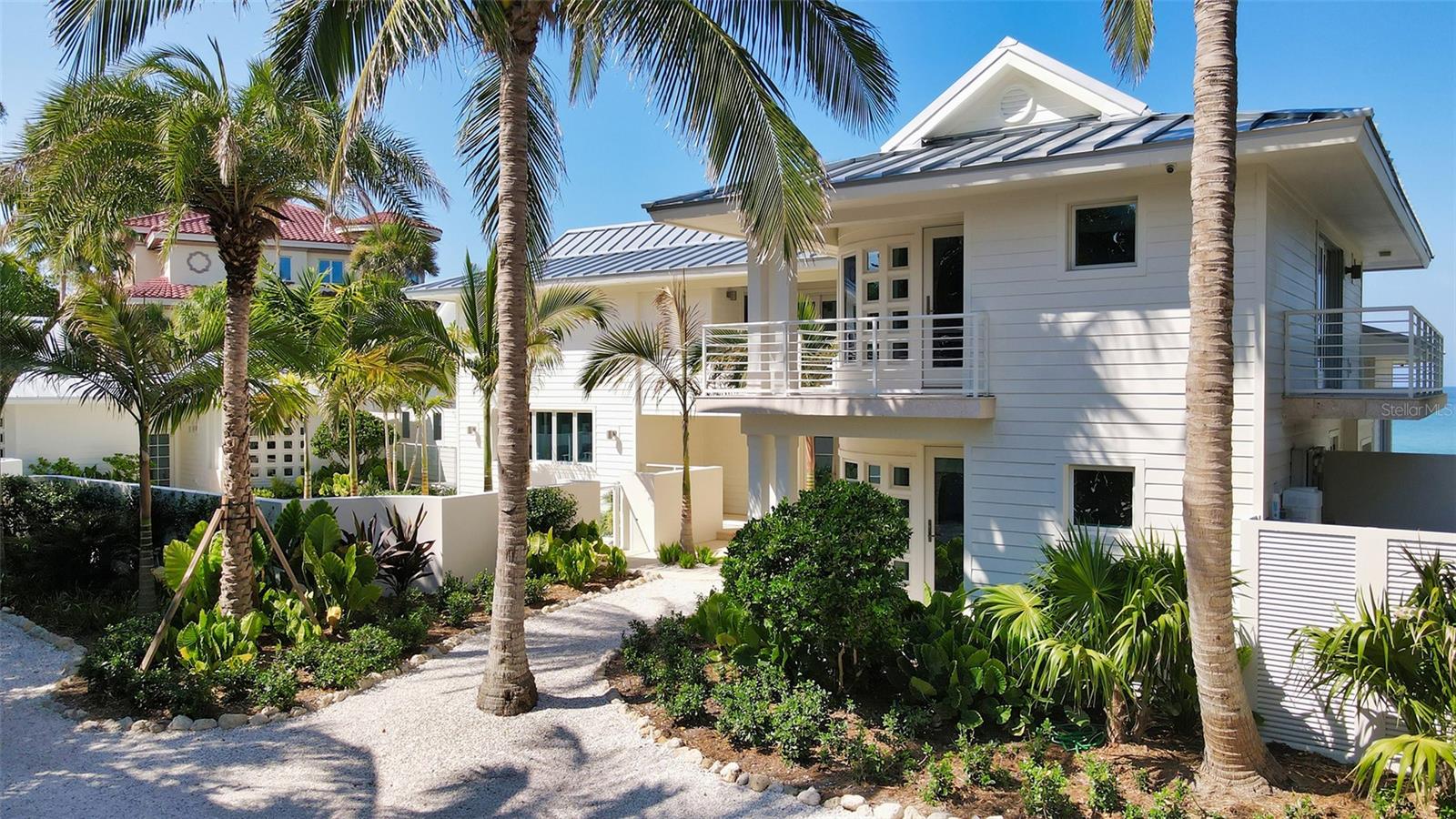 Introducing Casey Key's ultimate zen-inspired beachfront compound. Built in 2011, all structures have undergone a newly completed 3-year remodel, successfully achieving the feeling of a new home, now ready for your immediate enjoyment. Imagine enjoying walks along the shore, with your canine companion allowed, swimming in the Gulf, beach combing or casting a fishing line from your sandy beach. At the end of the day, mesmerizing sunsets like an artist's palette never disappoint. With approximately 160 ft of frontage on the Gulf of Mexico's protected shoreline, this exquisite property transports you to a world of nature's beauty. A sense of privacy is assured from the stately palm tree-lined gated entry, lush foliage and wide setbacks from adjacent properties. As the owner-designer worked directly with Sarasota's premier architectural firm CMSA, fine finishes and furnishings were curated from international design firms to create a sense of understated elegance in this impeccable home. Noted general contractor, Jackson and Associates, maintained the highest standards in luxury home building. The new pool and spa designed by Nautilus Pools is a refreshing addition to the estate, wrapped in an artfully designed walled courtyard setting for privacy. Upon entry, the enchantment begins as the eye travels through the light-filled living area directly out to the azure Gulf hues. As you move from each space, the floor plan flows seamlessly. The soft clean lines implement natural materials with a neutral palette and layering of textures. This home is intentionally designed to pay homage to the natural environment with indoor and outdoor connections, never competing with the views. Enjoy meal preparation in the well-designed Wolf, SubZero, Miele kitchen featuring a quartzite-topped island perfect for eating in. With views to the Gulf from every room, the connection to nature is endless. As you enter the beautifully appointed owner's suite, a private den affords a place to enjoy reading, a movie, or use as a work-from-home office. Retreat to the luxurious owner's bath and its flexible area with custom sauna. Family or guests ascend the glass paneled staircase to enjoy two ensuite bedrooms with a sitting balcony. Other guests will enjoy their own cabana with its large ensuite bedroom, built-in entertainment center and large seating area. Completing the outdoor amenities are two enclosed showers, one near the master suite and the other next to the beach cabana, a new outdoor kitchen by Elite. Here you will enjoy entertaining family and friends from multiple lounging areas, outdoor dining, or taking a dip in the pool--all creating resort style living. The 3-car conditioned garage with climate-controlled wine room has been updated with new electric doors, new insulation and sheetrock, epoxy floor and organizational storage shelf unit, plus a washer and dryer for guest cabana use. Casey Key, the 8 mile crown jewel of Sarasota's islands with low density, is the choice for those who appreciate that commercial development is prohibited. Located just minutes south is the historic town of Venice to enjoy shopping or dining, or one can drive 15 miles north for Sarasota's vast array of cultural offerings. Two bridges afford access to I-75 and private or commercial airports. Come live the dream of owning a glorious beachfront home for your immediate enjoyment! Room Feature: Linen Closet In Bath (Bedroom 4). Room Feature: Linen Closet In Bath (Primary Bedroom).