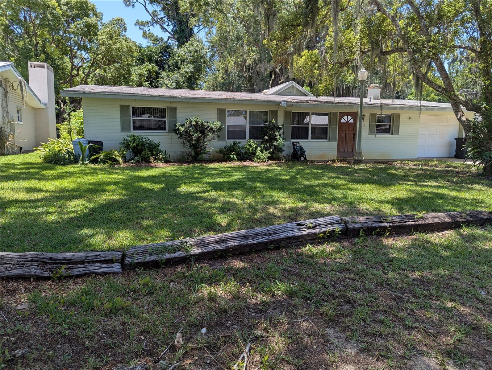 This 3 bedroom 2 bath home , built in 1965,is still owner by the original owner. The roof is leaking and has to be replaced and there are other issues that need attention. But, there are other features that make it desirable.  Located in a quiet, established neighborhood. This home and property have had no  flooding issues. There is no HOA or monthly dues. The Family Room addition features tile flooring, wood burning stone fireplace with gas option. The Master Bathroom has been modernized with walk-in shower. Terrazzo flooring in all Bedrooms . Main areas have laminate flooring over the terrazzo. Fenced  yard backs up to a treed area for privacy. Centrally located just 2 miles to bustling Canal Street and 4miles to Flagler Avenue and the beach.  Just waiting for the perfect family to make it their own.