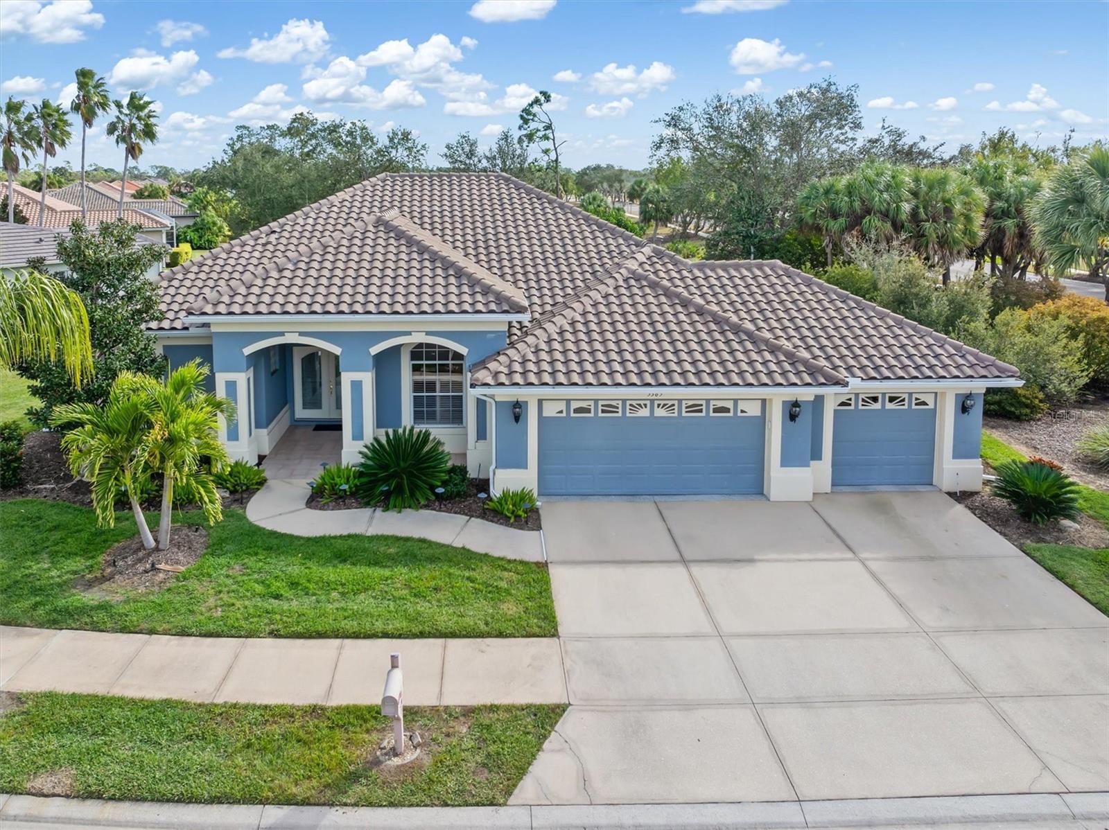 Welcome to elevated Florida living in the highly sought-after Heron Creek Golf & Country Club! Perfectly positioned on a premium homesite overlooking the #1 tee of the challenging Marsh Course, this beautifully maintained 3-bedroom, 2-bath luxury residence with a rare 3-car garage offers the ideal blend of elegance, comfort, and resort-style amenities. From the moment you arrive, you’ll appreciate the inviting curb appeal, lush tropical landscaping, and upscale lifestyle that awaits beyond the gates. Step inside to discover over 2,000 square feet of thoughtfully designed living space featuring soaring ceilings, abundant natural light, spacious living and dining areas, and exceptional storage throughout — including the rare Florida favorite, a true coat closet! The open-concept design flows seamlessly to the expansive covered lanai where your private heated spa invites relaxation while enjoying front-row views of golf, nature, and breathtaking sunsets.

The kitchen is perfectly positioned for entertaining and everyday living, offering generous cabinetry, ample prep space, and easy connection to the main living areas. The spacious primary suite provides a peaceful retreat with tranquil views, a luxurious ensuite bath, and abundant closet space. Whether you’re seeking year-round living or a seasonal escape, this home offers the perfect backdrop for enjoying the Heron Creek lifestyle.

Heron Creek Golf & Country Club is renowned for its 27-hole championship golf experience, elegant clubhouse, fitness center, tennis courts, community pool, vibrant social calendar, and guarded gate entry — all just moments from your door. Located close to Gulf beaches, Wellen Park, CoolToday Park, shopping, dining, and medical facilities, this is more than a home… it’s a lifestyle.

Live where every day feels like a vacation — luxury, leisure, and location come together at 5365 Pine Shadow Lane. Schedule your private showing today and experience why Heron Creek remains one of North Port’s premier gated golf communities.