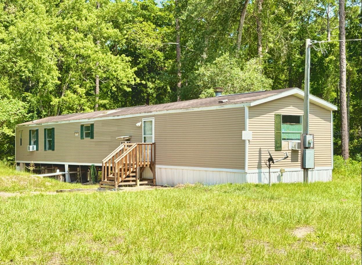 Under contract-accepting backup offers. Investor Special Near Lakes & Outdoor Recreation!  This 2-bedroom, 2-bath 1995 single-wide mobile home needs updating and is being sold As-Is. The property offers potential as an investment, a weekend getaway, or an affordable home project for the right buyer.
With some TLC, this property could become a weekend retreat, rental investment, or primary residence. Enjoy nearby access to area lakes and outdoor recreation; Lake Grandin is approximately 9 minutes away and features a public boat ramp, while Lake Ida is only about 4 minutes away, providing additional opportunities for boating, fishing, and enjoying Florida living.
Cash buyers preferred; owner financing is available for qualified buyers.
Sold As-Is. Buyer to verify all measurements and property details.